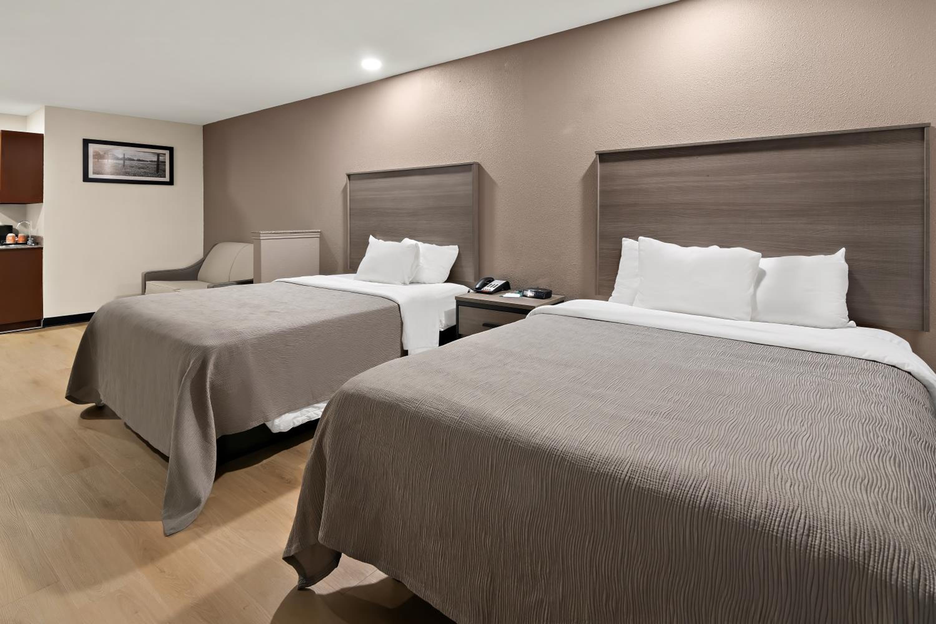 Queen Suite with Two Queen Beds and Sofa - Non Smoking/Interior Hall - Photo 9