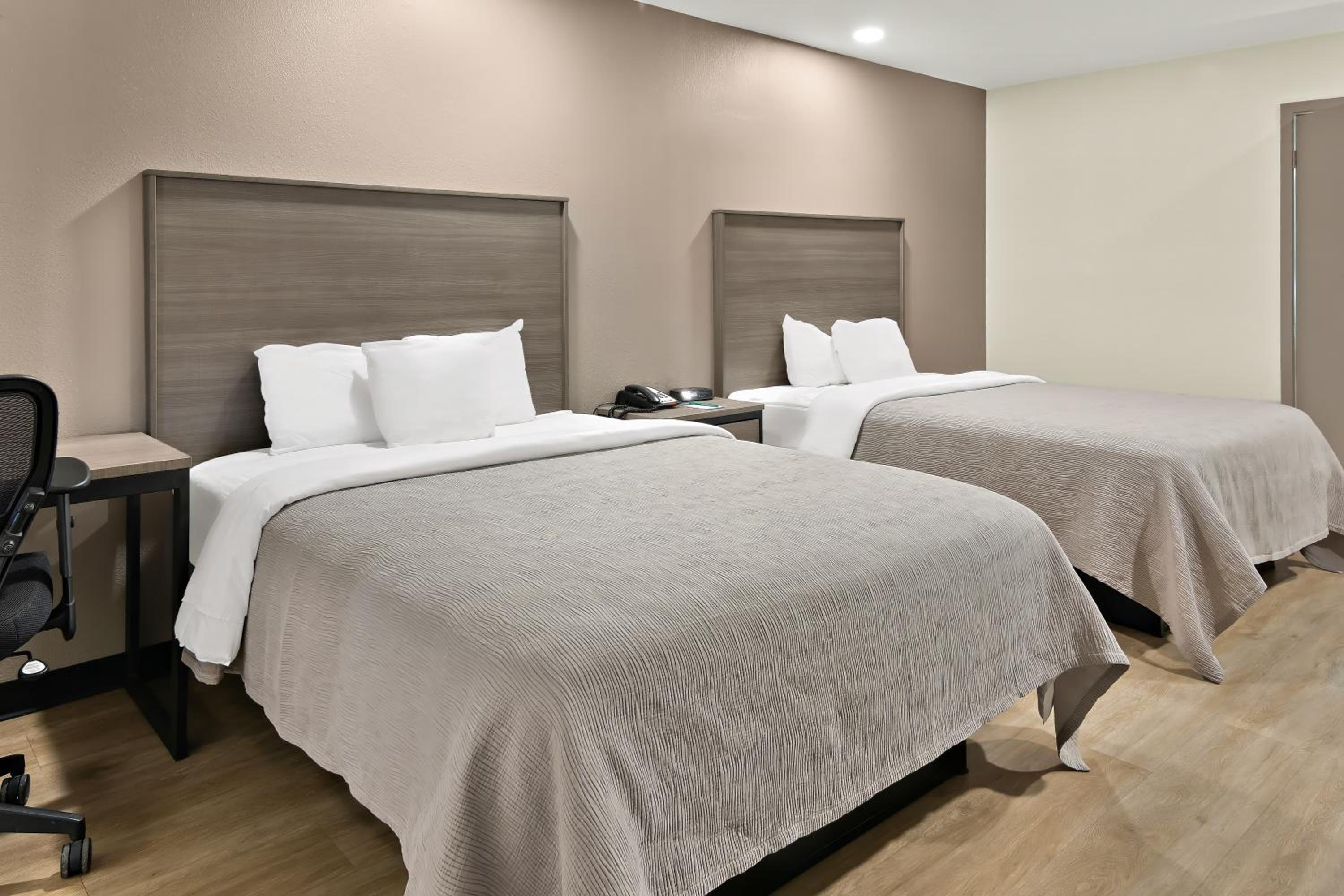 Queen Suite with Two Queen Beds and Sofa - Non Smoking/Interior Hall - Photo 5