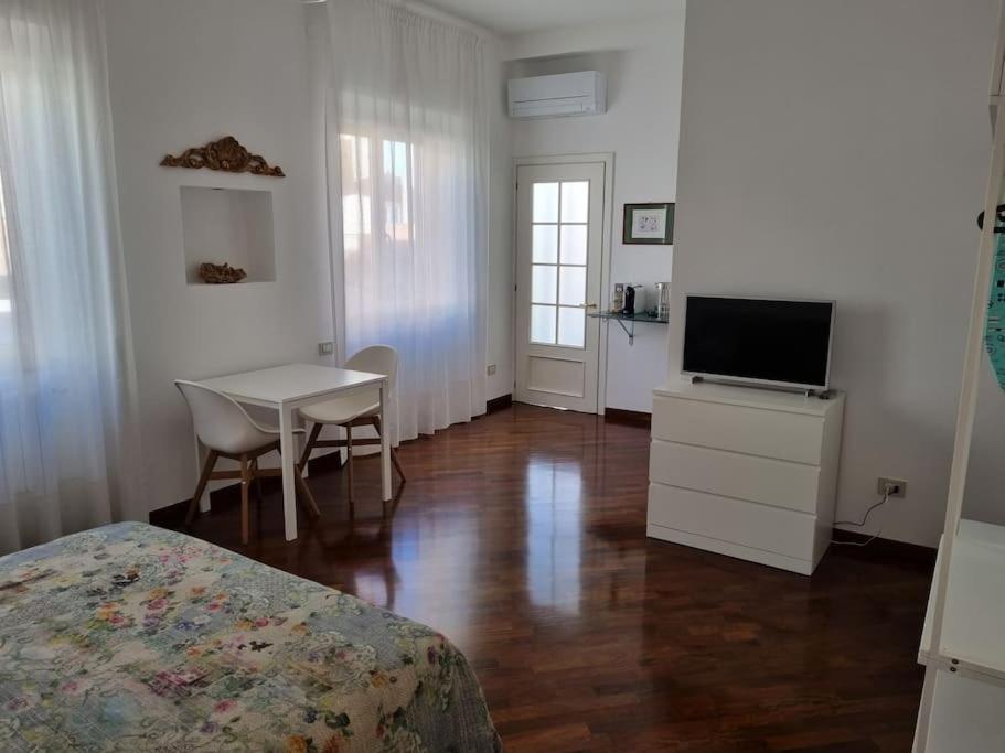 One-Bedroom Apartment with Balcony and City View