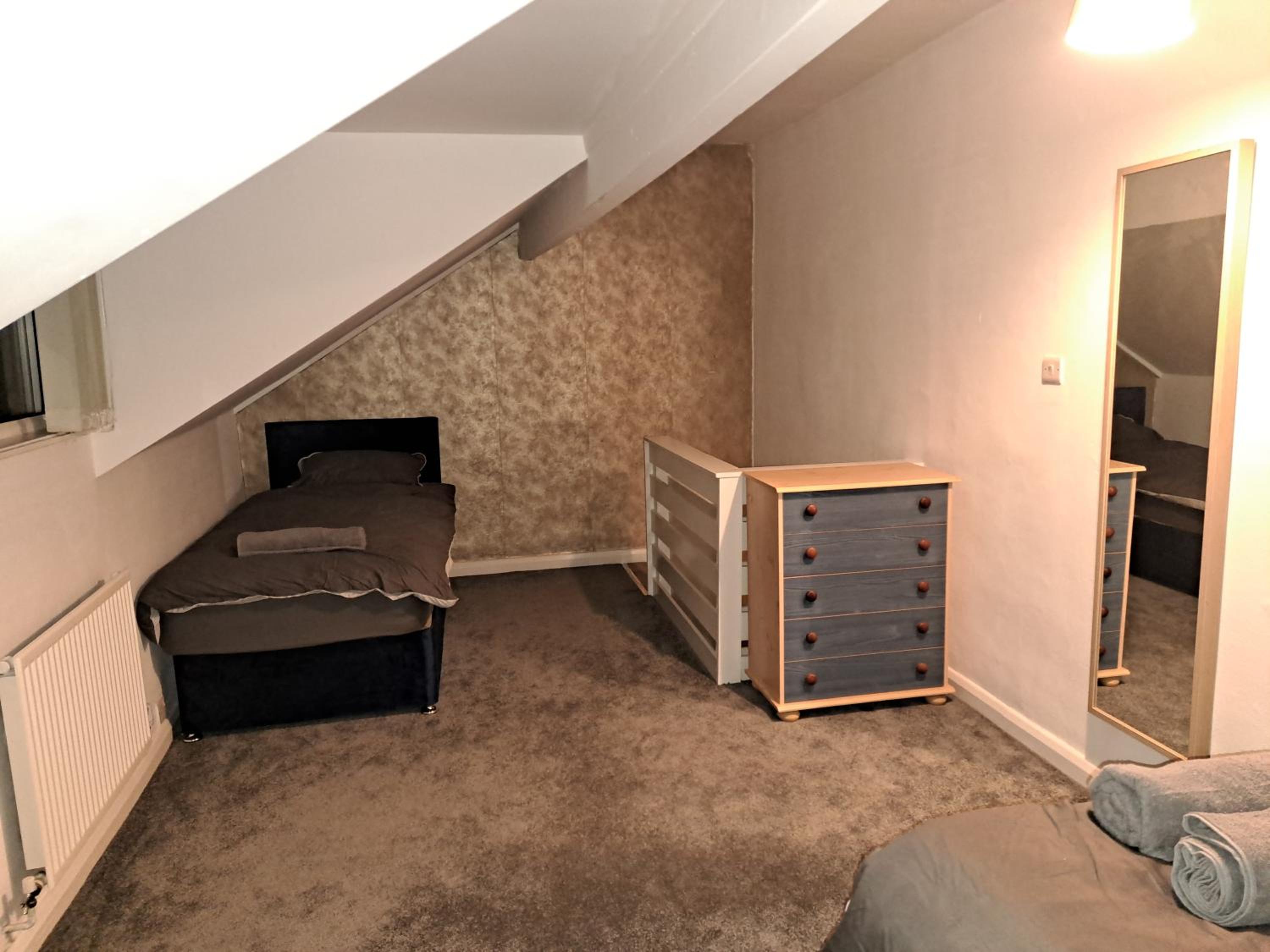 Three-Bedroom Apartment photo 1