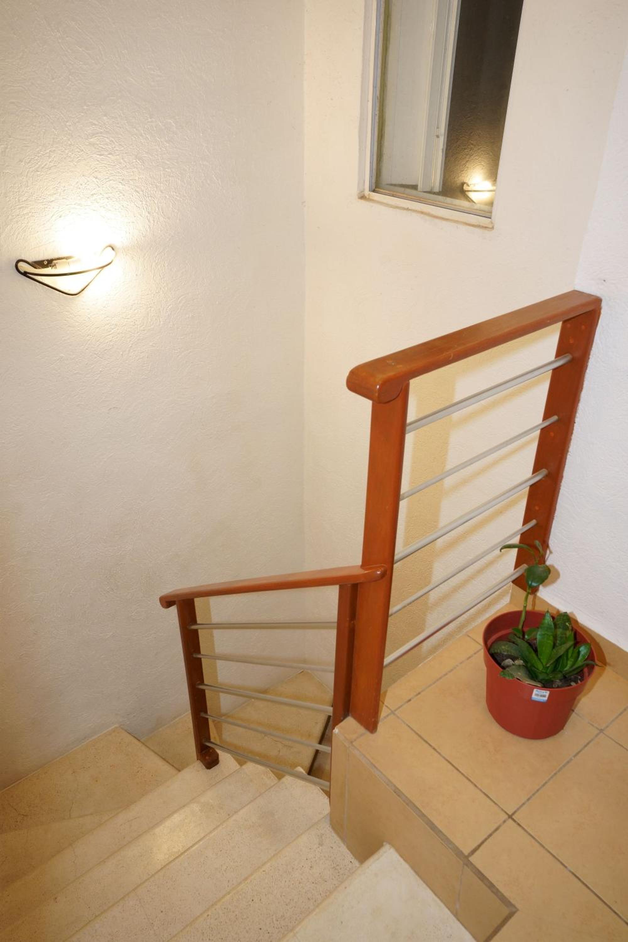 Three-Bedroom House - Photo 24