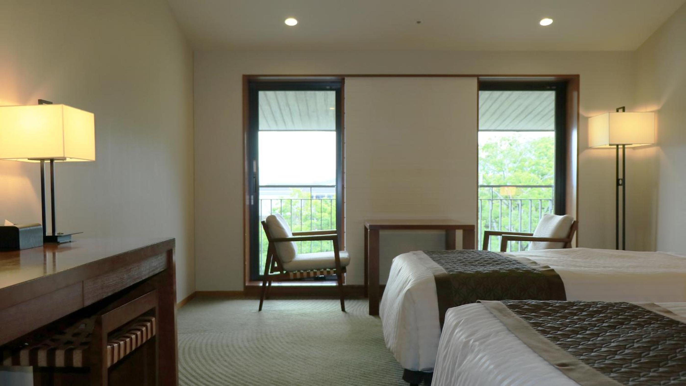 Twin Room with Extra Bed - Non-Smoking photo 2