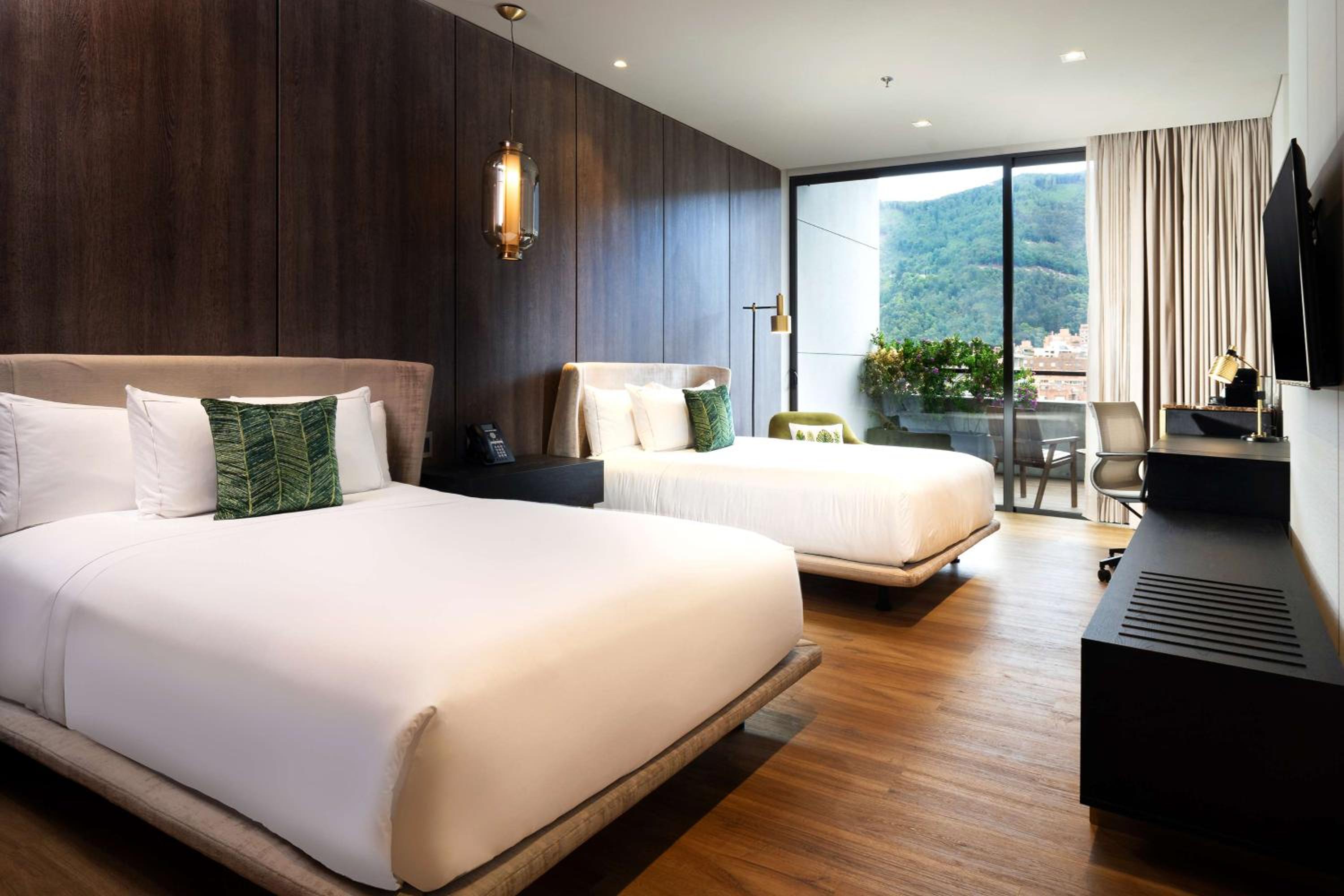 Queen Room with Two Queen Beds and Balcony - Photo 1