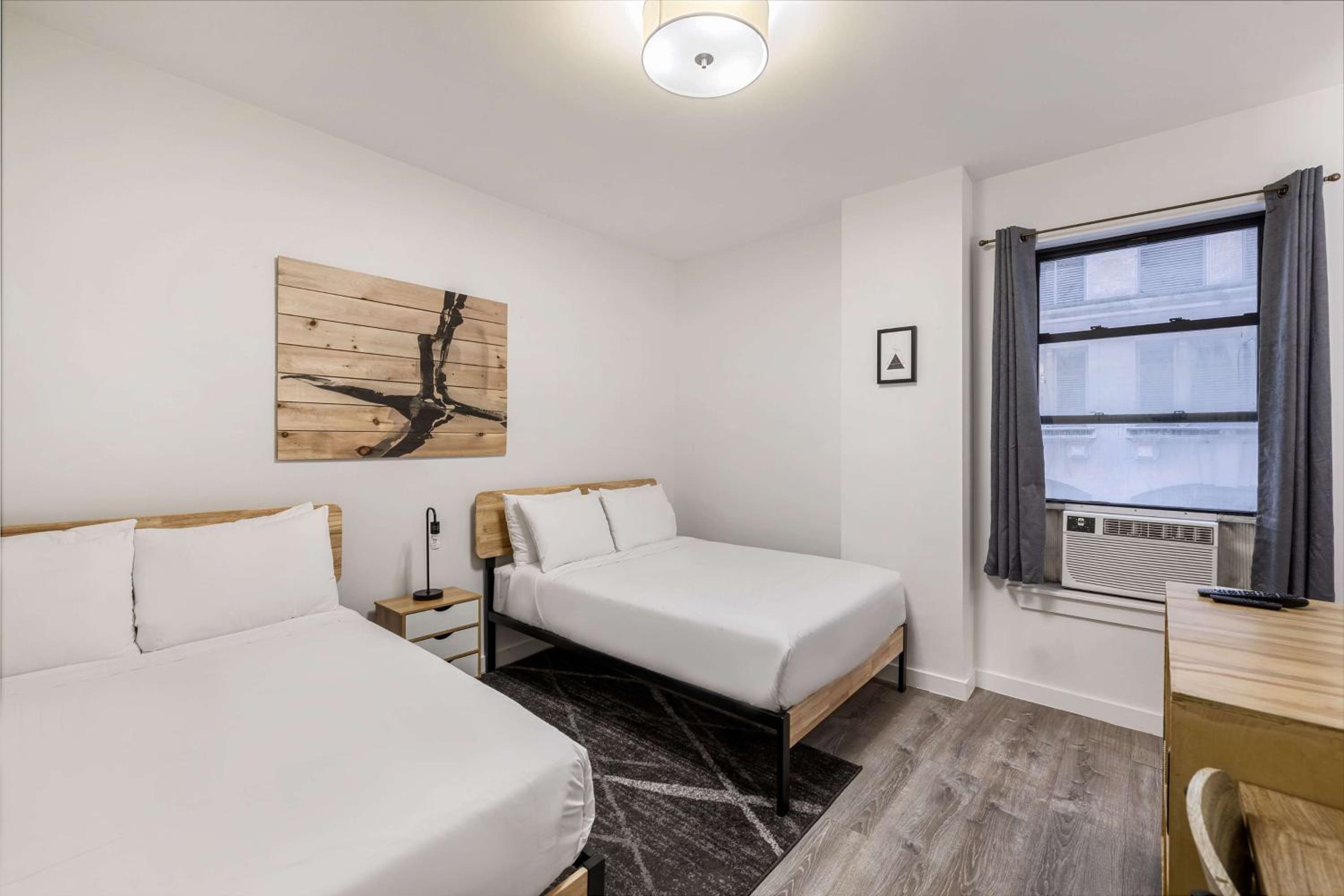 Double Room With Two Double Beds And Roll-In Shower - Mobility Access/Non-Smoking