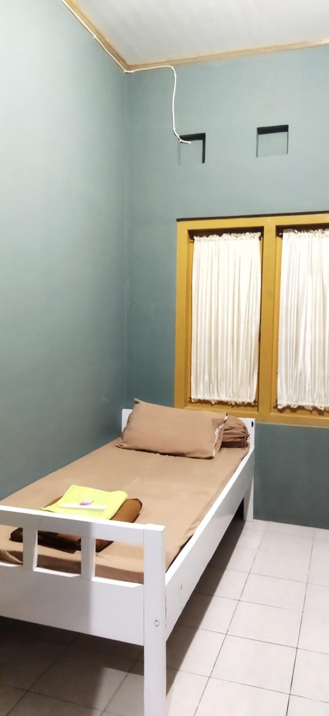 Single Bed in Female Dormitory Room