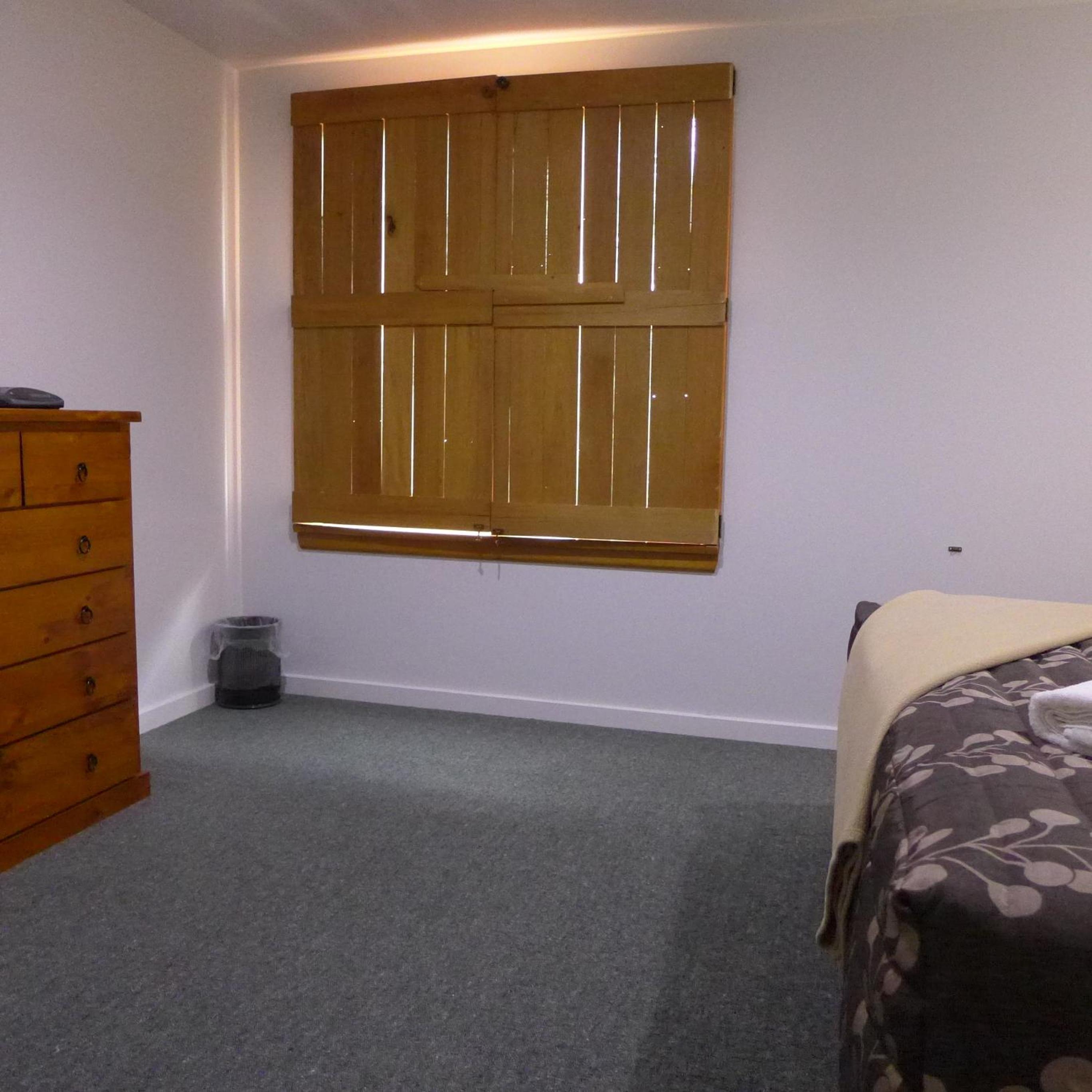 Three-Bedroom Apartment - Photo 19
