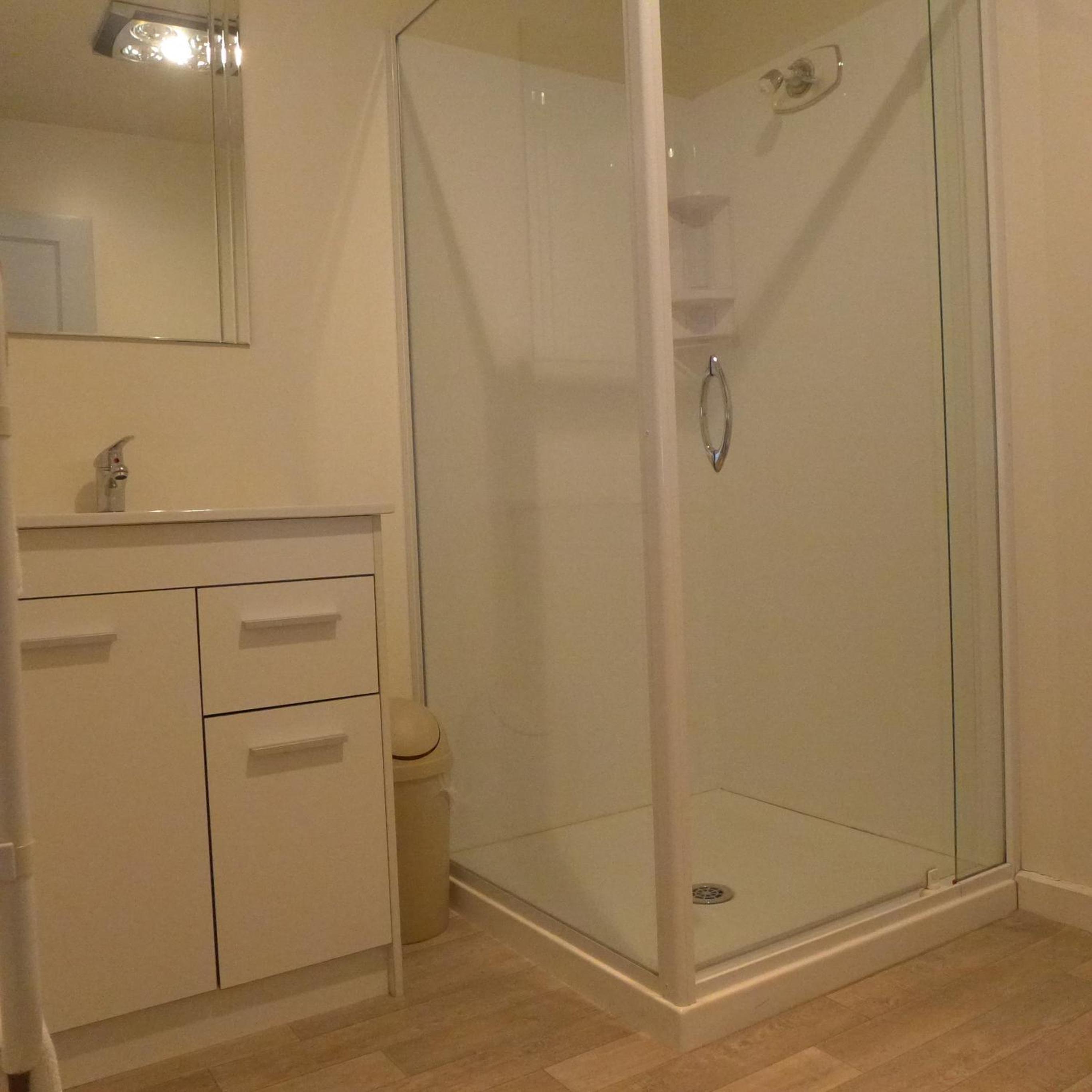 Three-Bedroom Apartment - Photo 21
