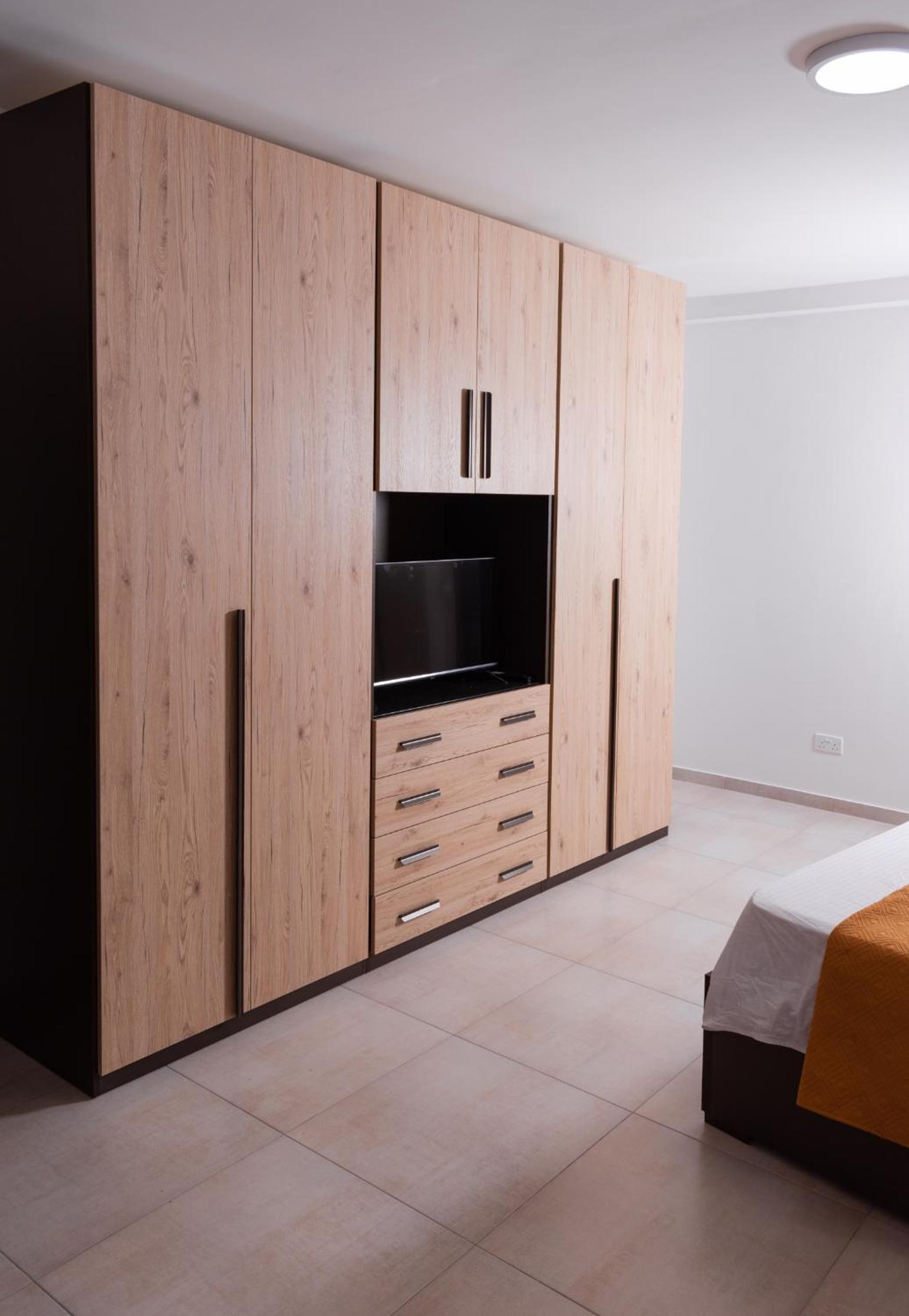 Three-Bedroom Apartment photo 2