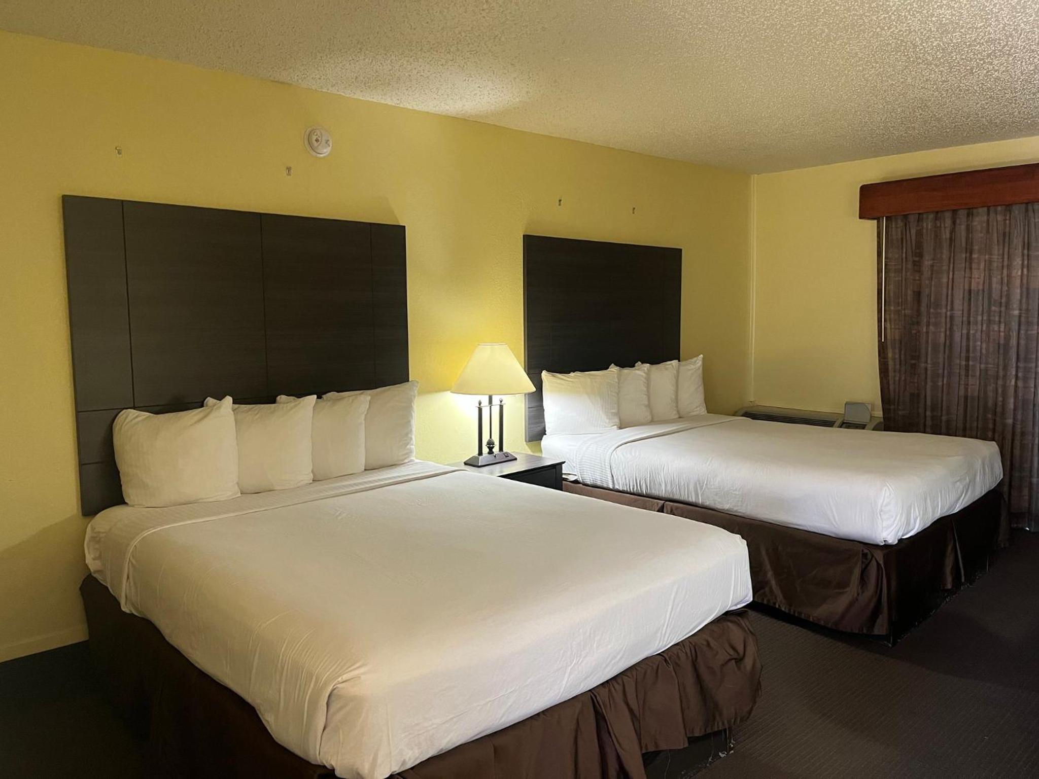 Suite with Two Queen Beds Disability Access Roll-In Shower Non-Smoking photo 1