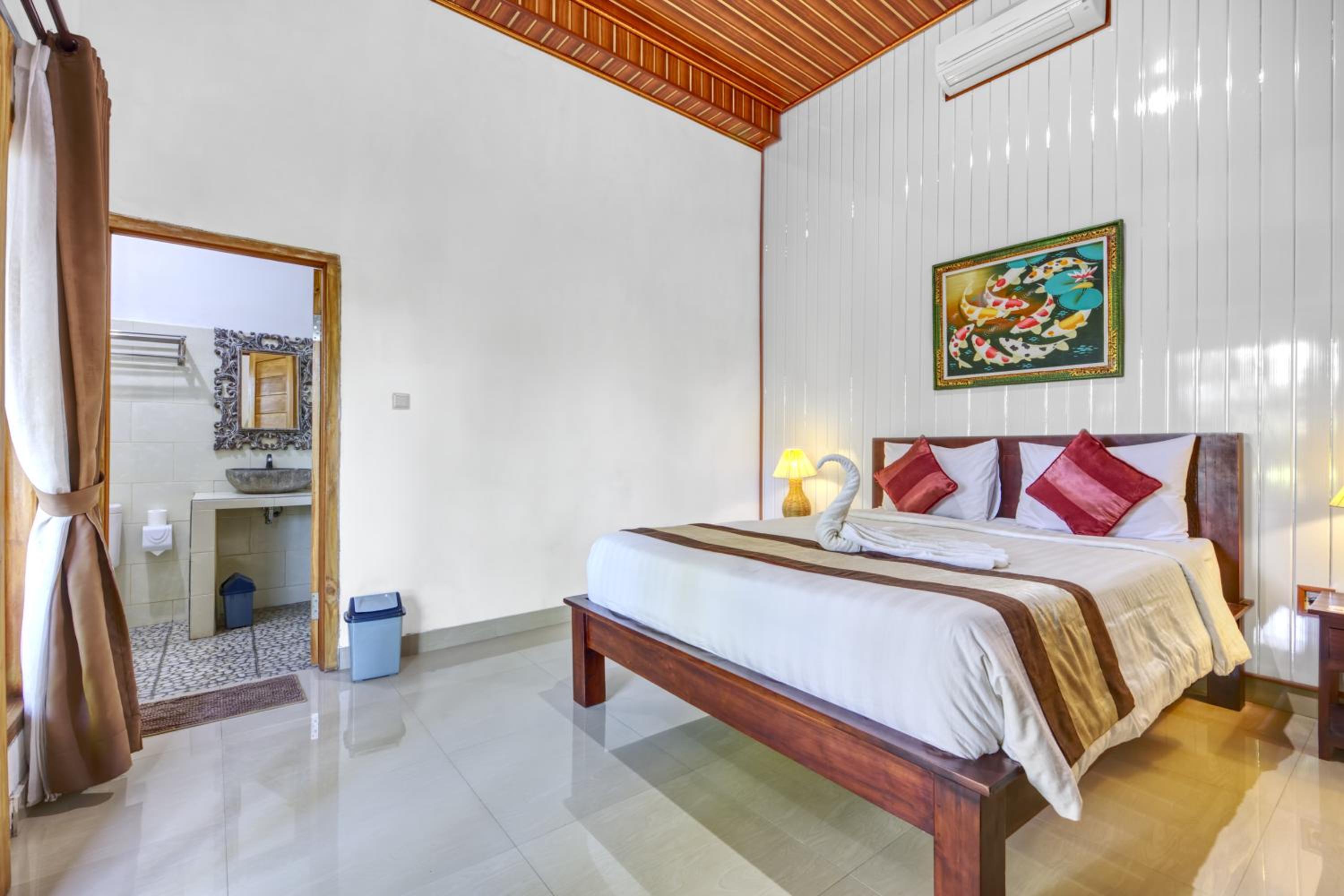 Deluxe Room - Photo 17