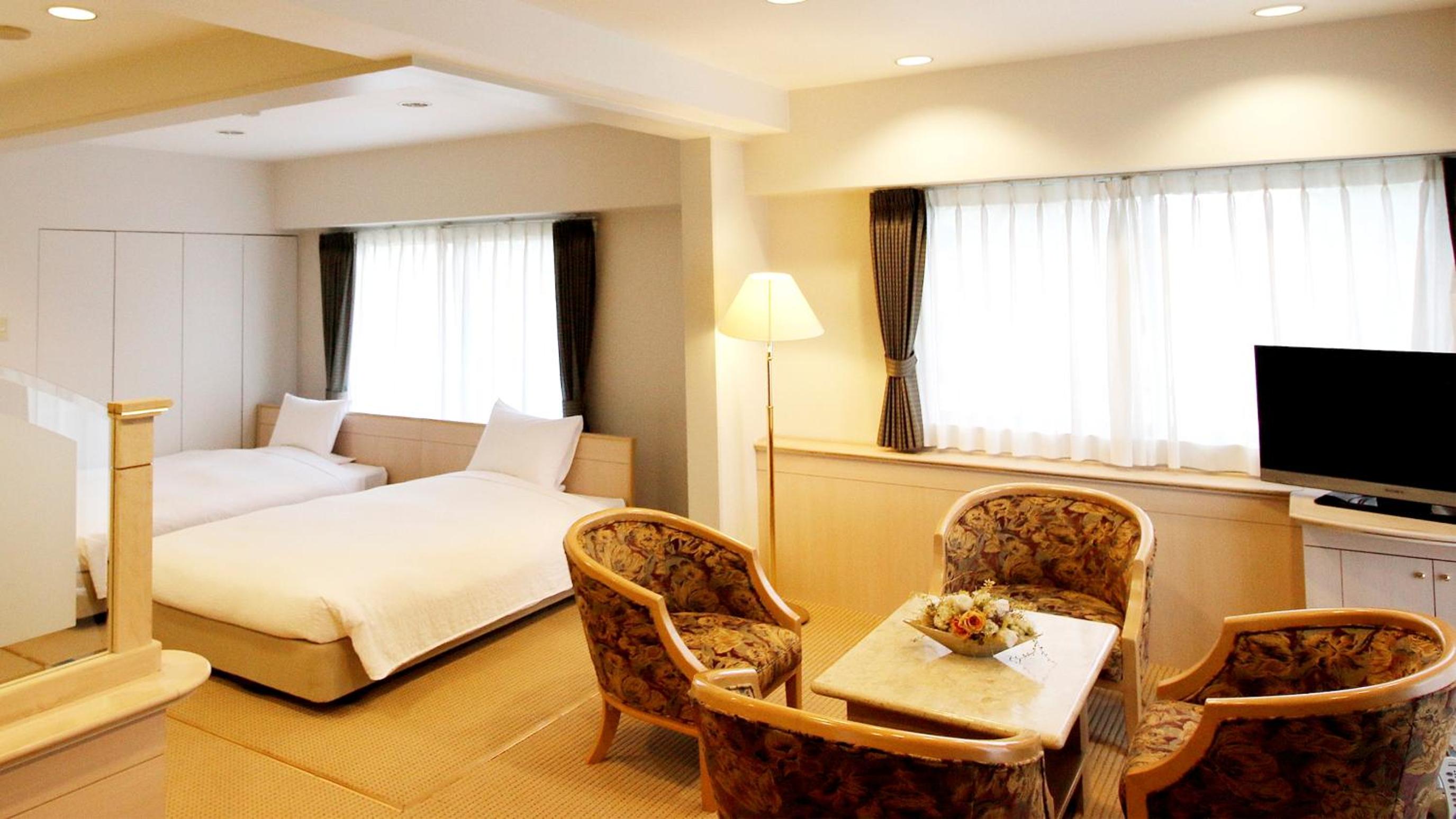 Deluxe Room - 2 Beds photo 2