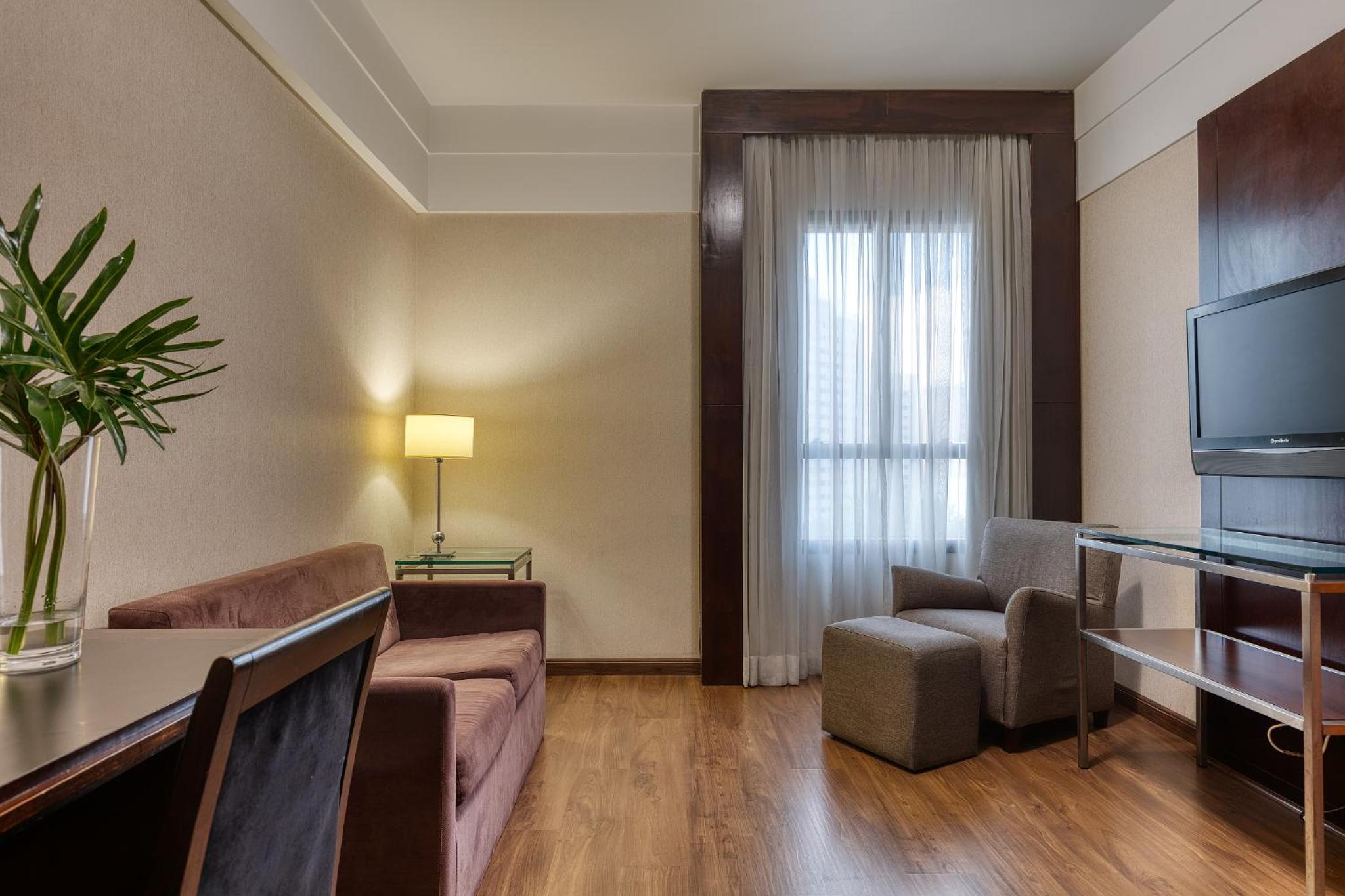 Junior Suite with Queen Bed and Sofa Bed - Photo 1