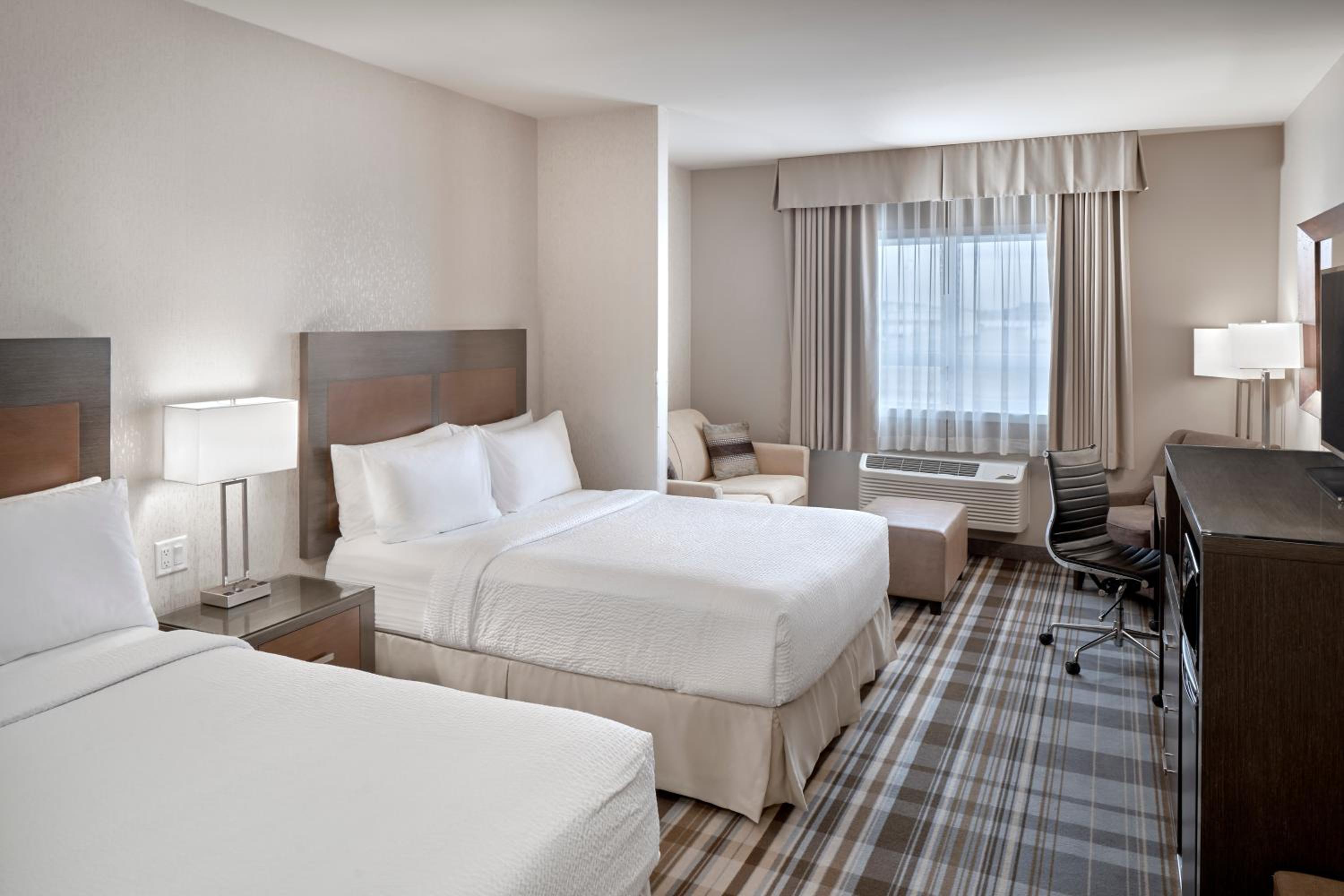 Standard Queen Room with Two Queen Beds and Sofa Bed