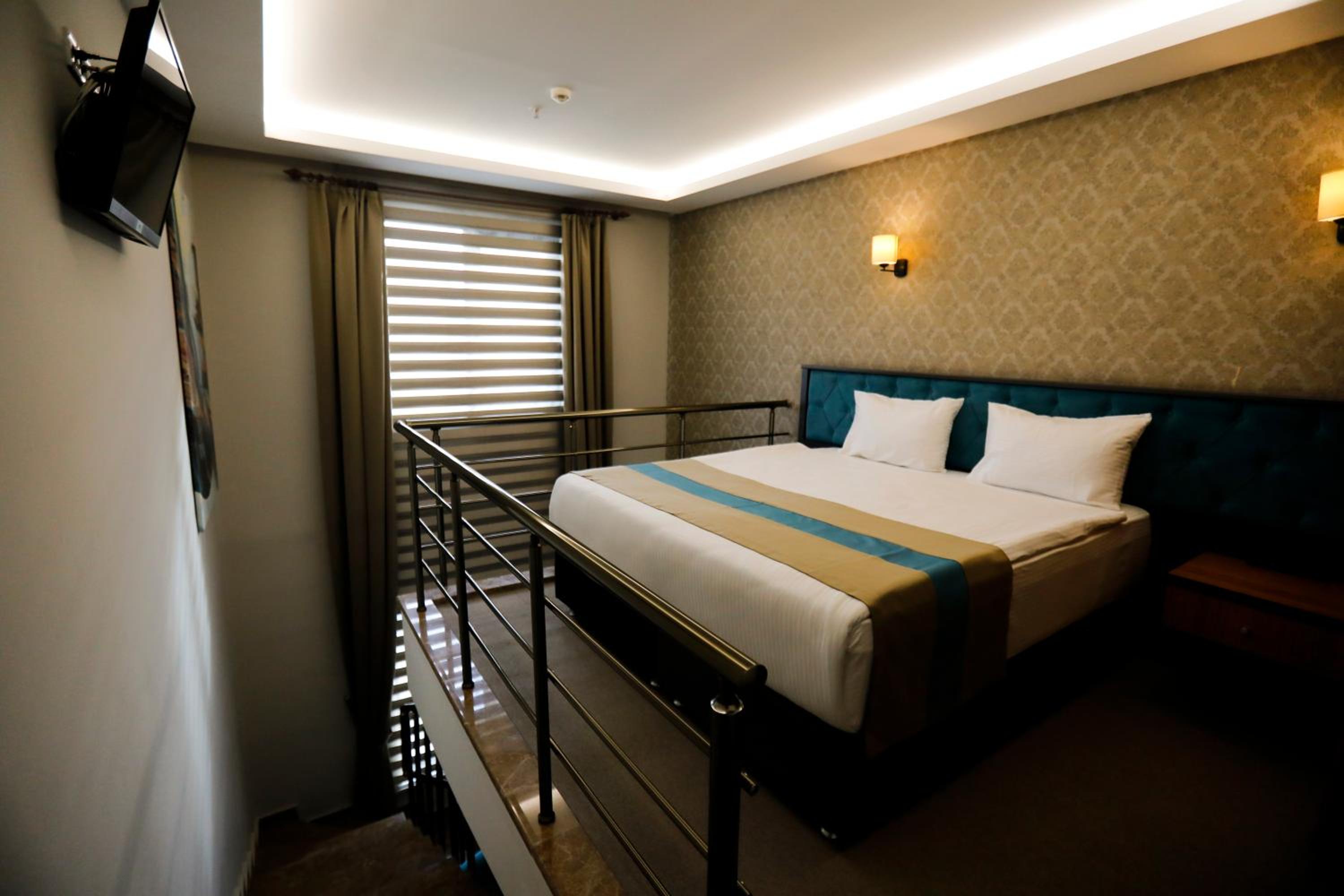 Duplex Suite with 1 Queen Size Bed and Sofa