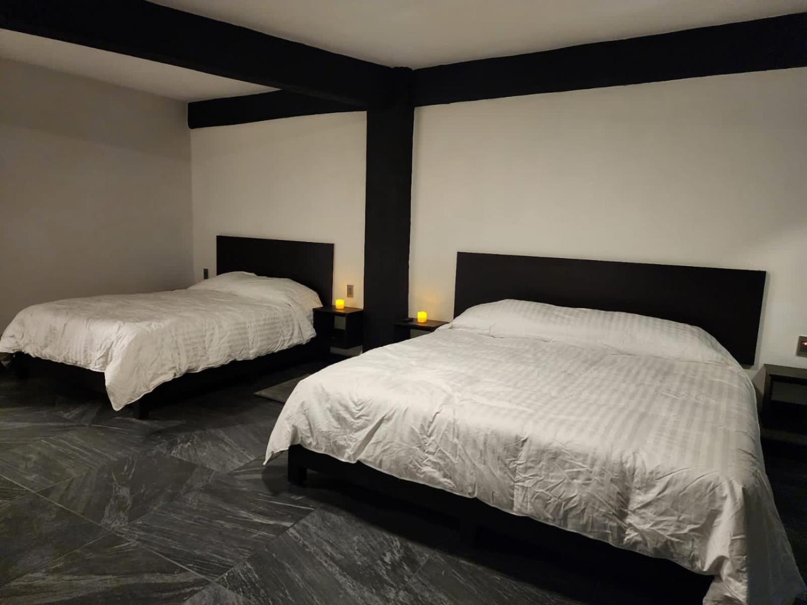 Deluxe Queen Room with Two Queen Beds photo 1