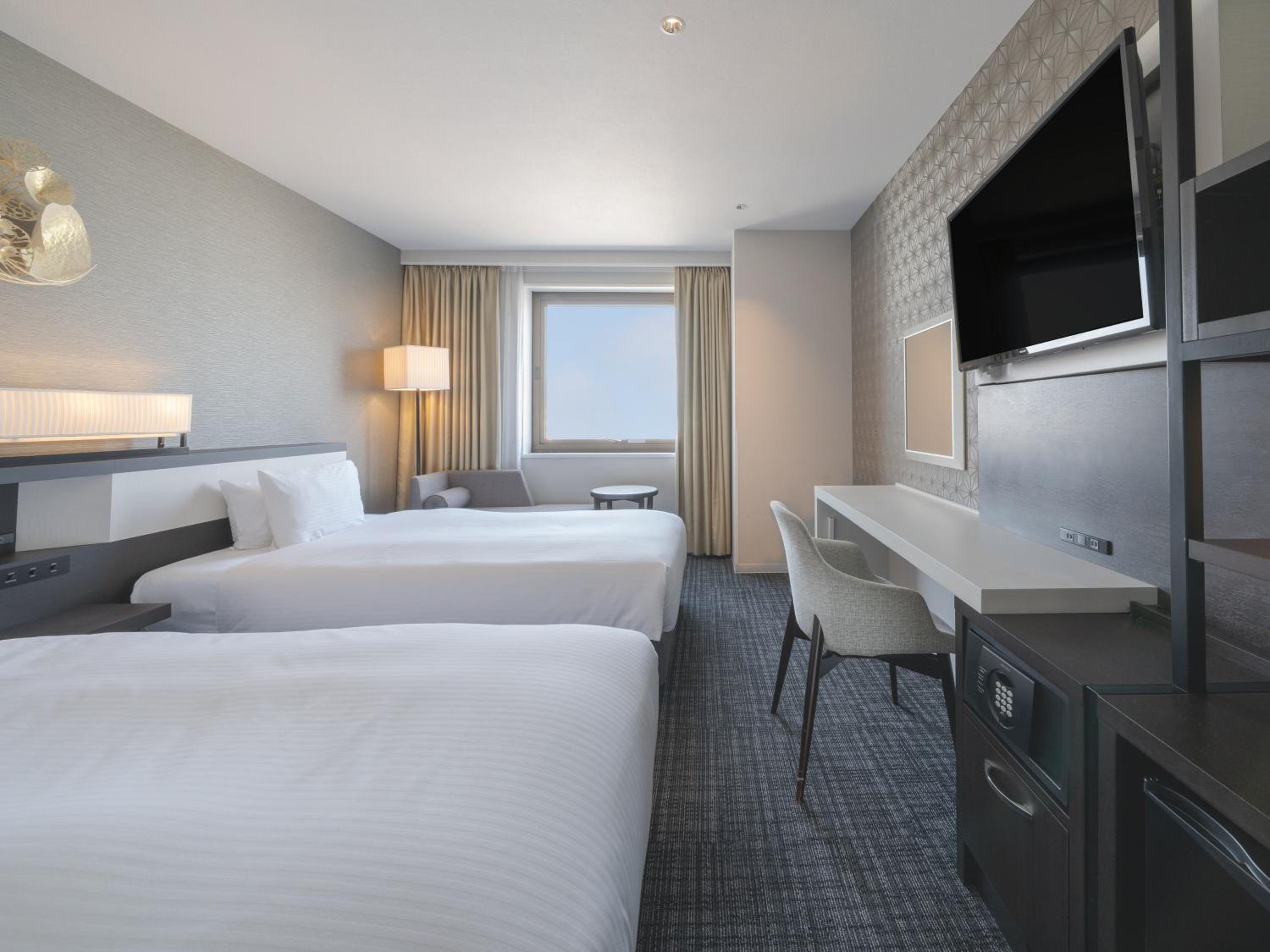 Twin Room - Non-Smoking - Photo 2