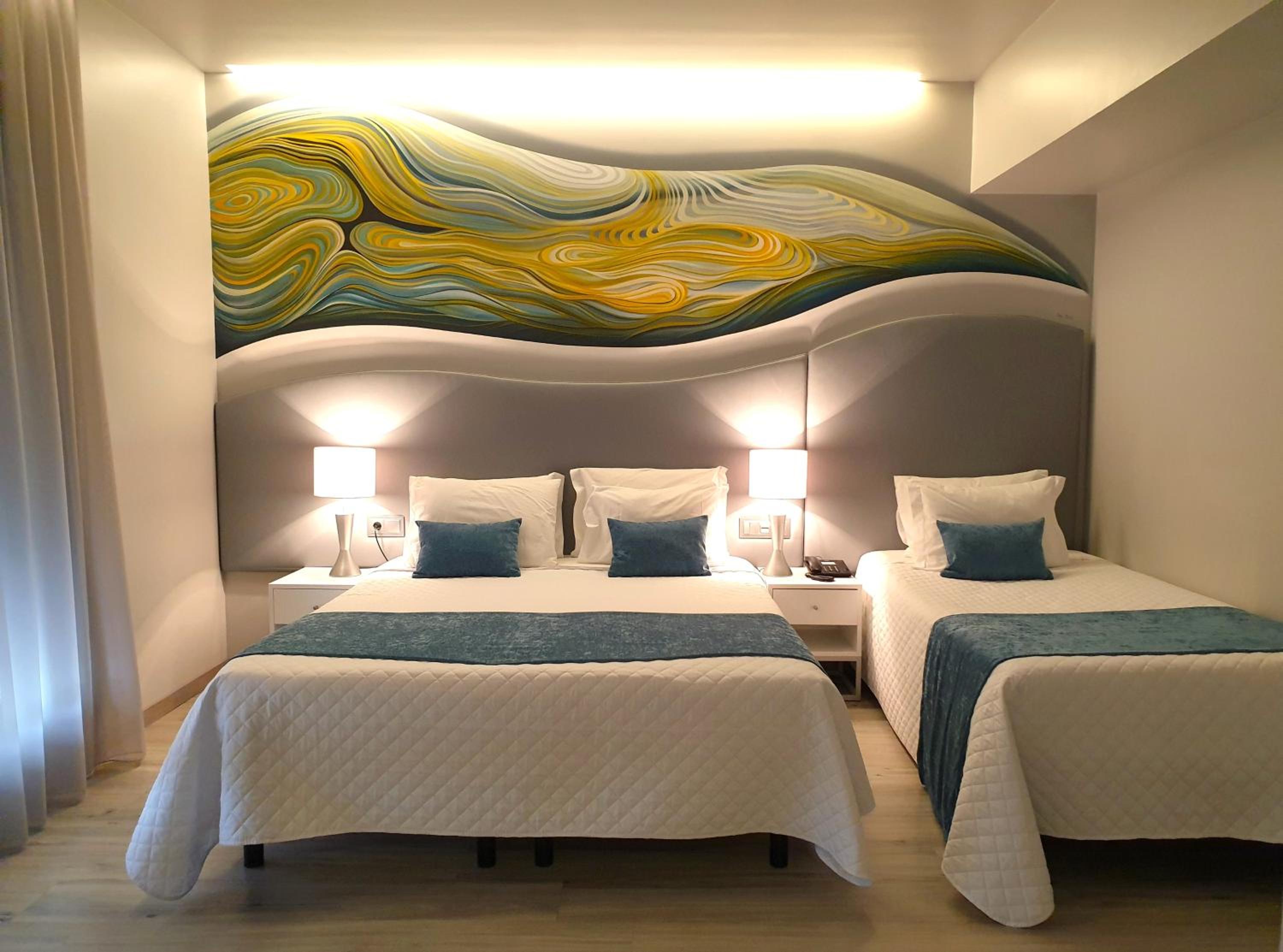 Deluxe Triple Room with Terrace and Sanctuary View