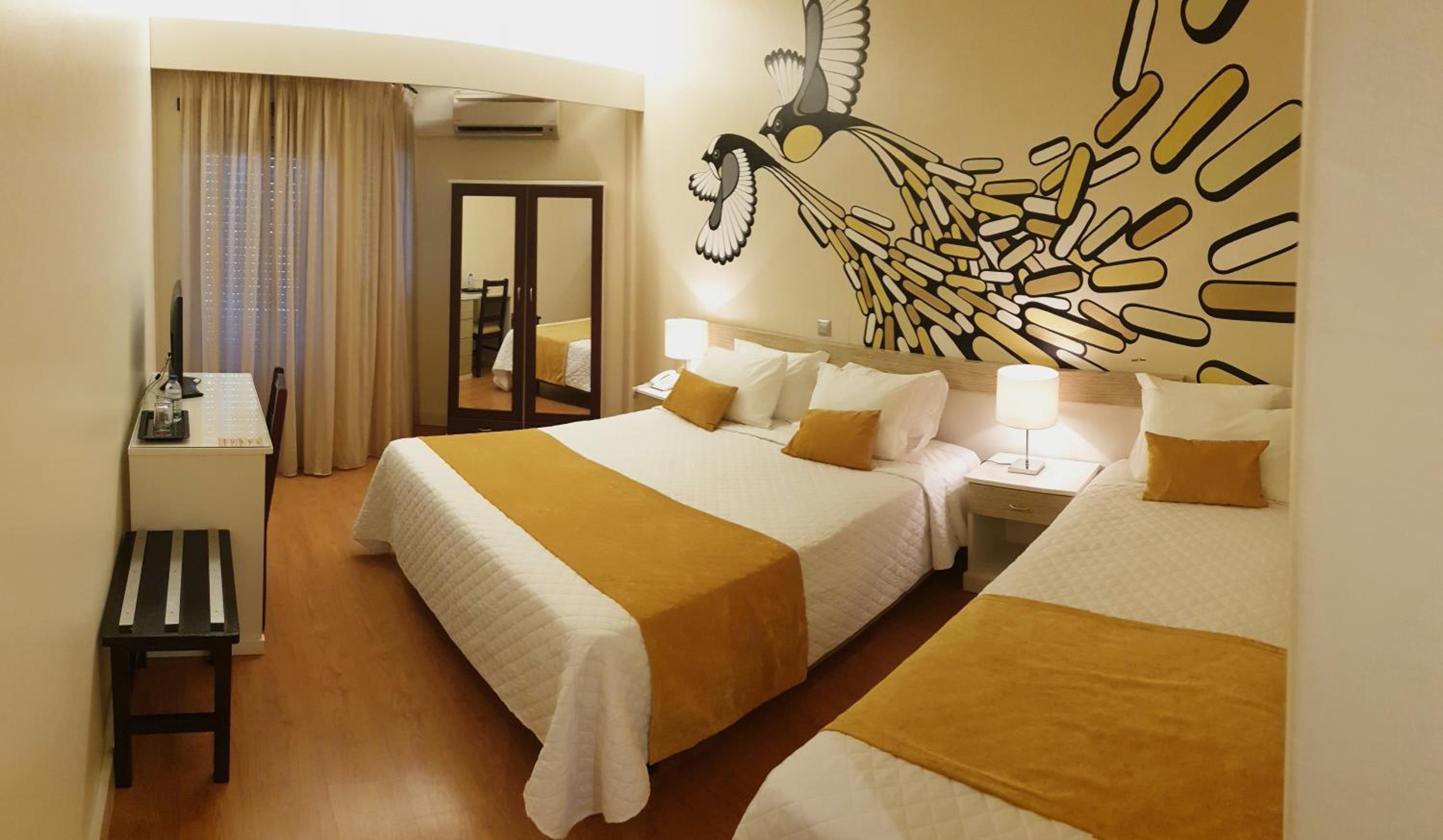 Room with One Double Bed and One Single Bed with Balcony