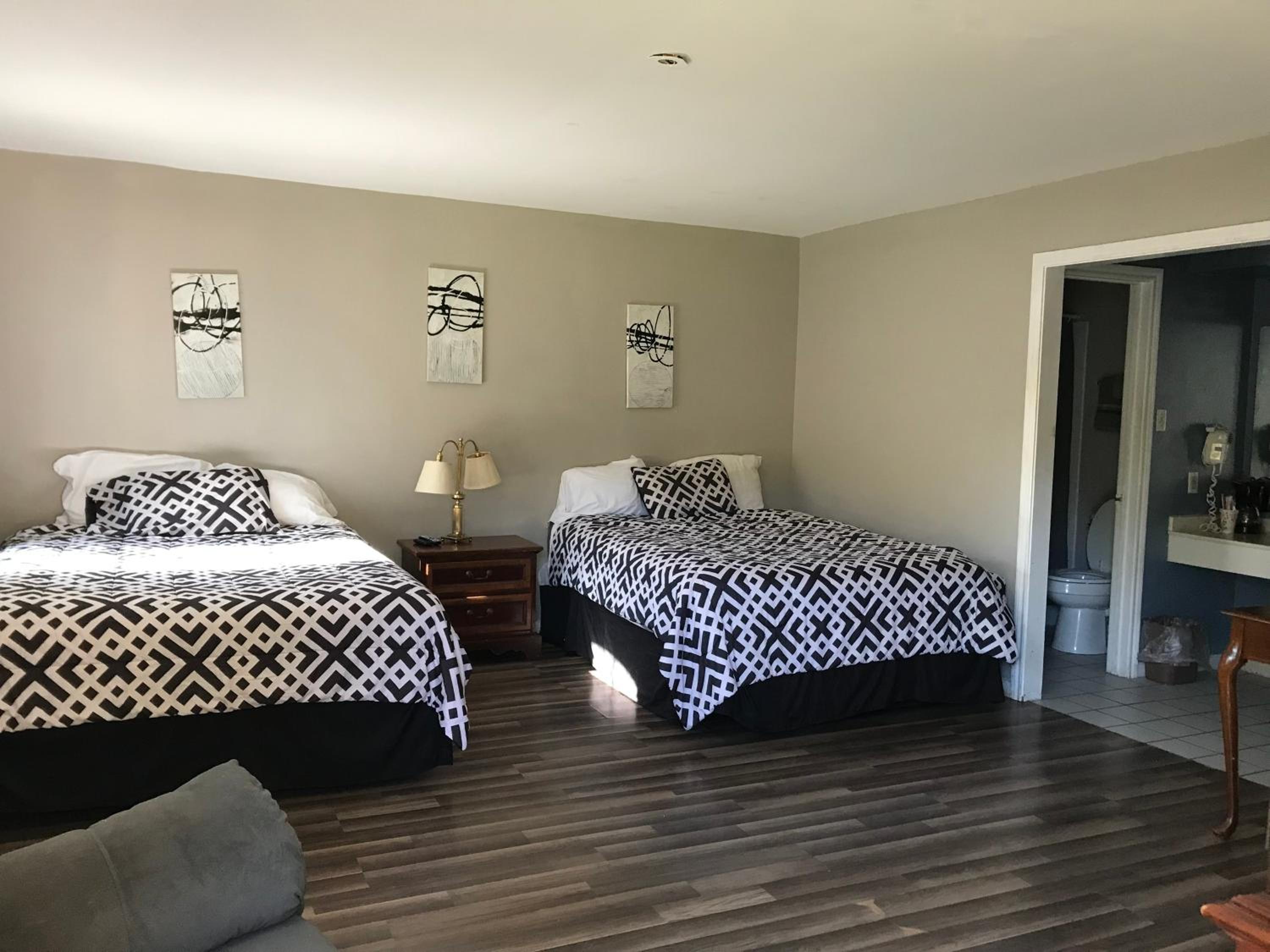 Queen Room with Two Queen Beds - Photo 1