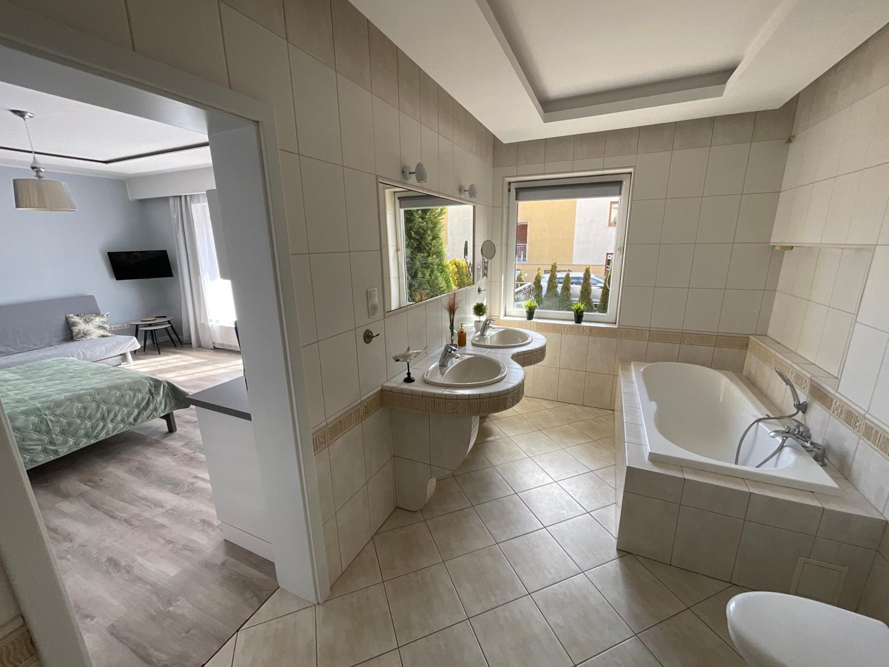 Deluxe Quadruple Room with Kitchenette photo 2