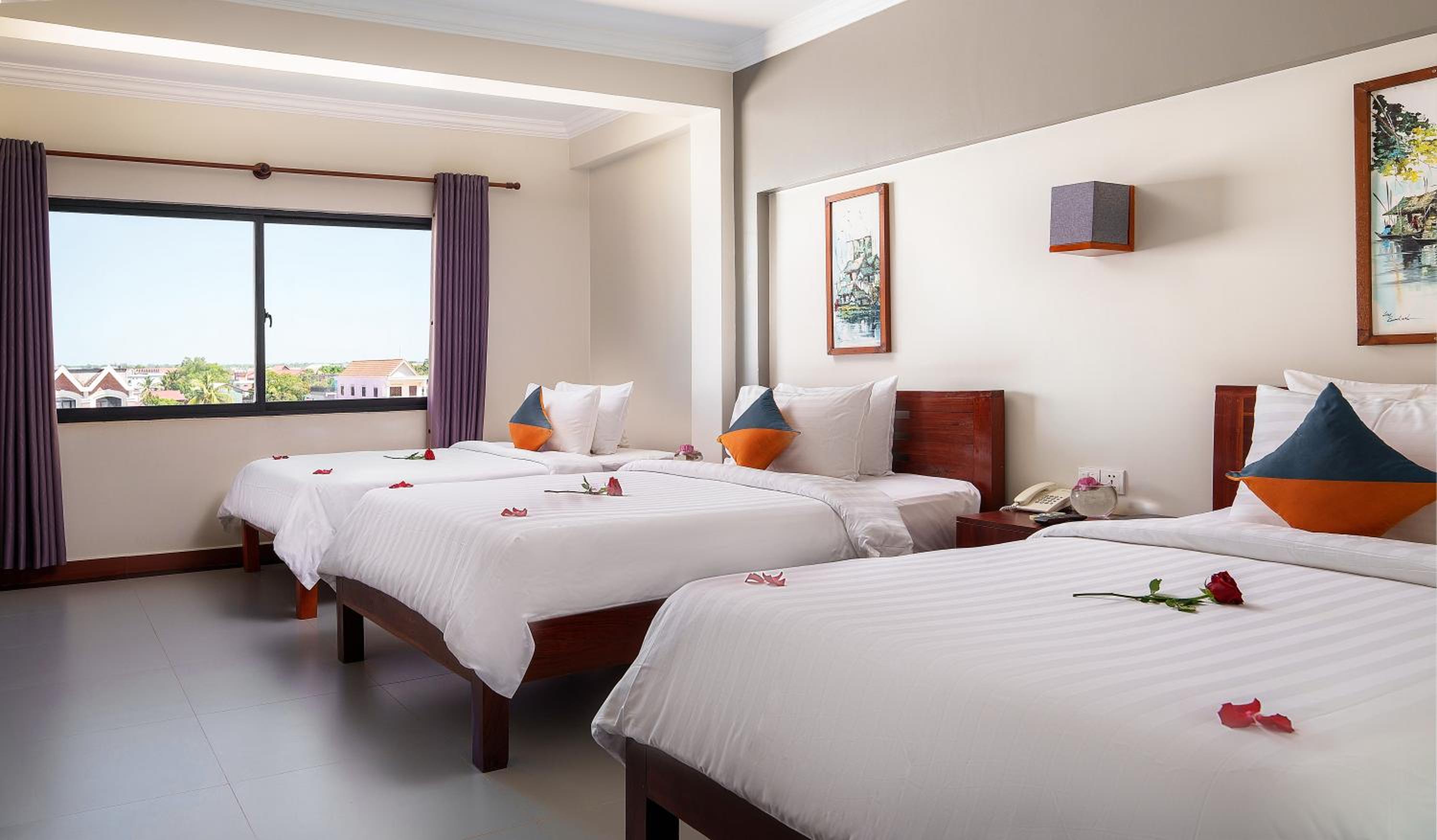 Deluxe Triple Room - Photo 8