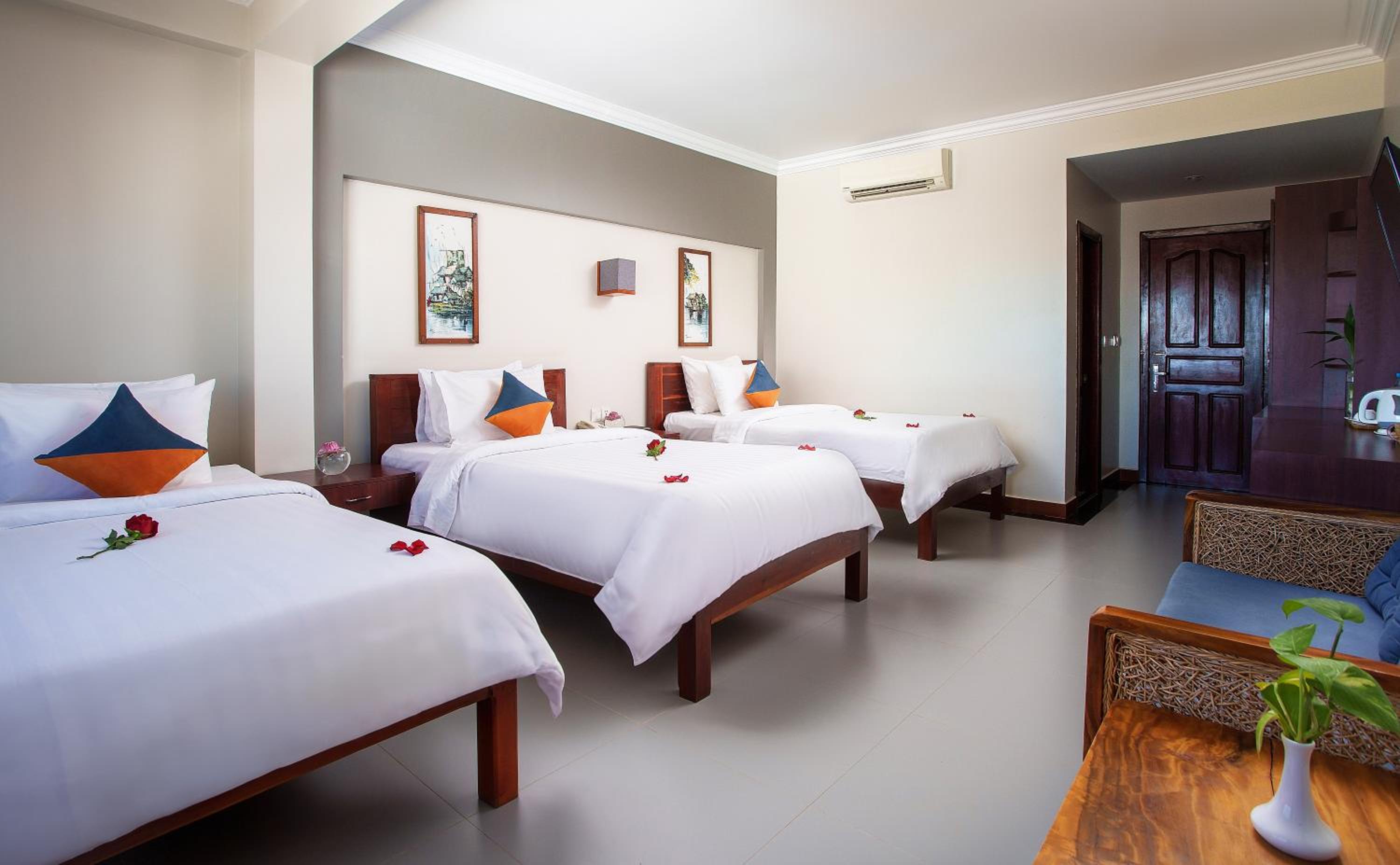 Deluxe Triple Room - Photo 1