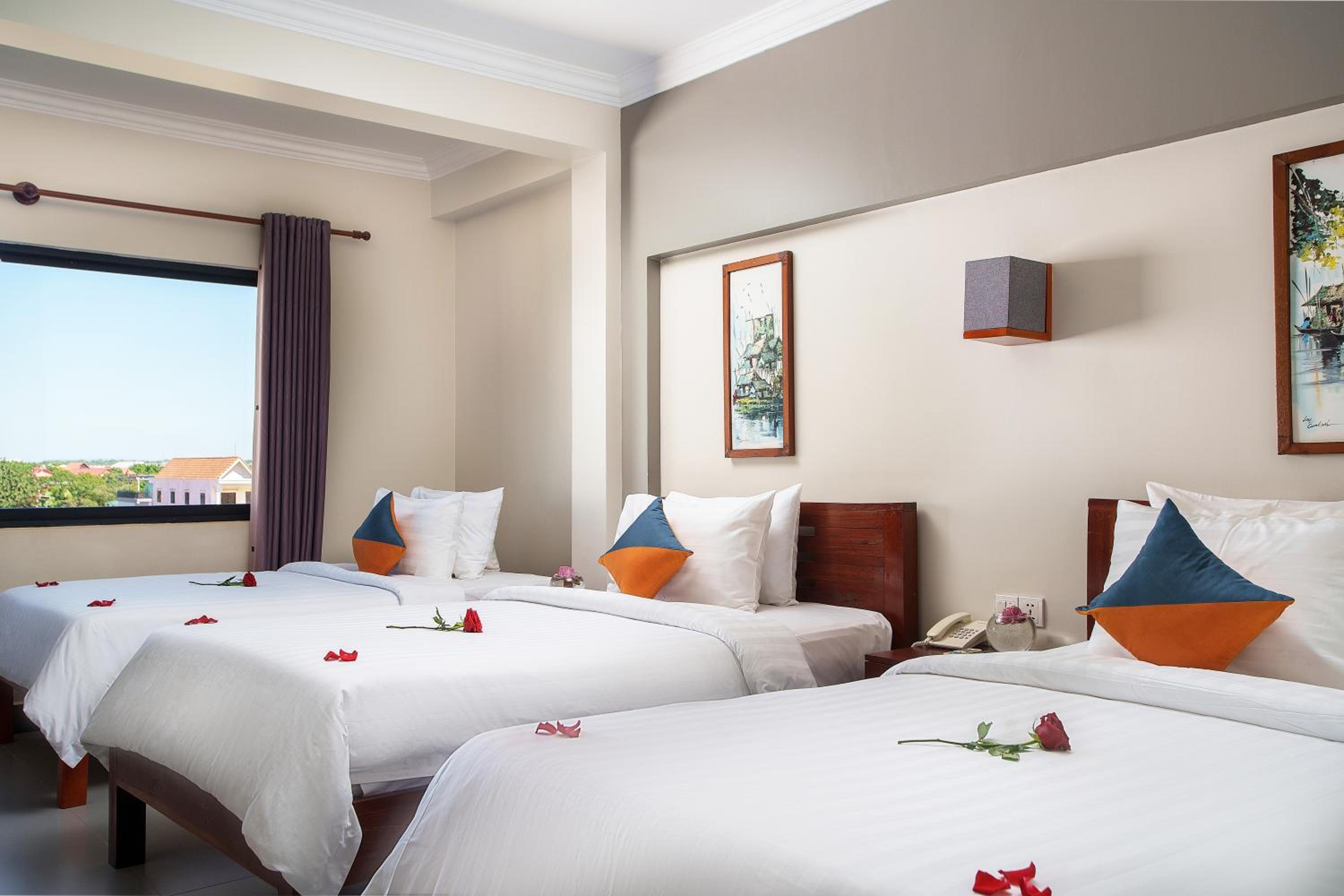 Deluxe Triple Room - Photo 7