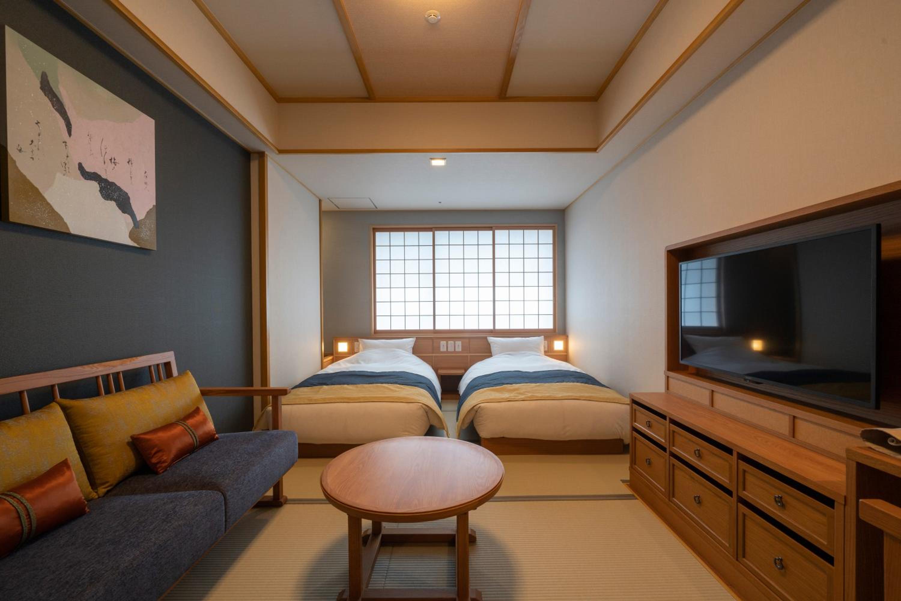 Deluxe Twin Room - Photo 1