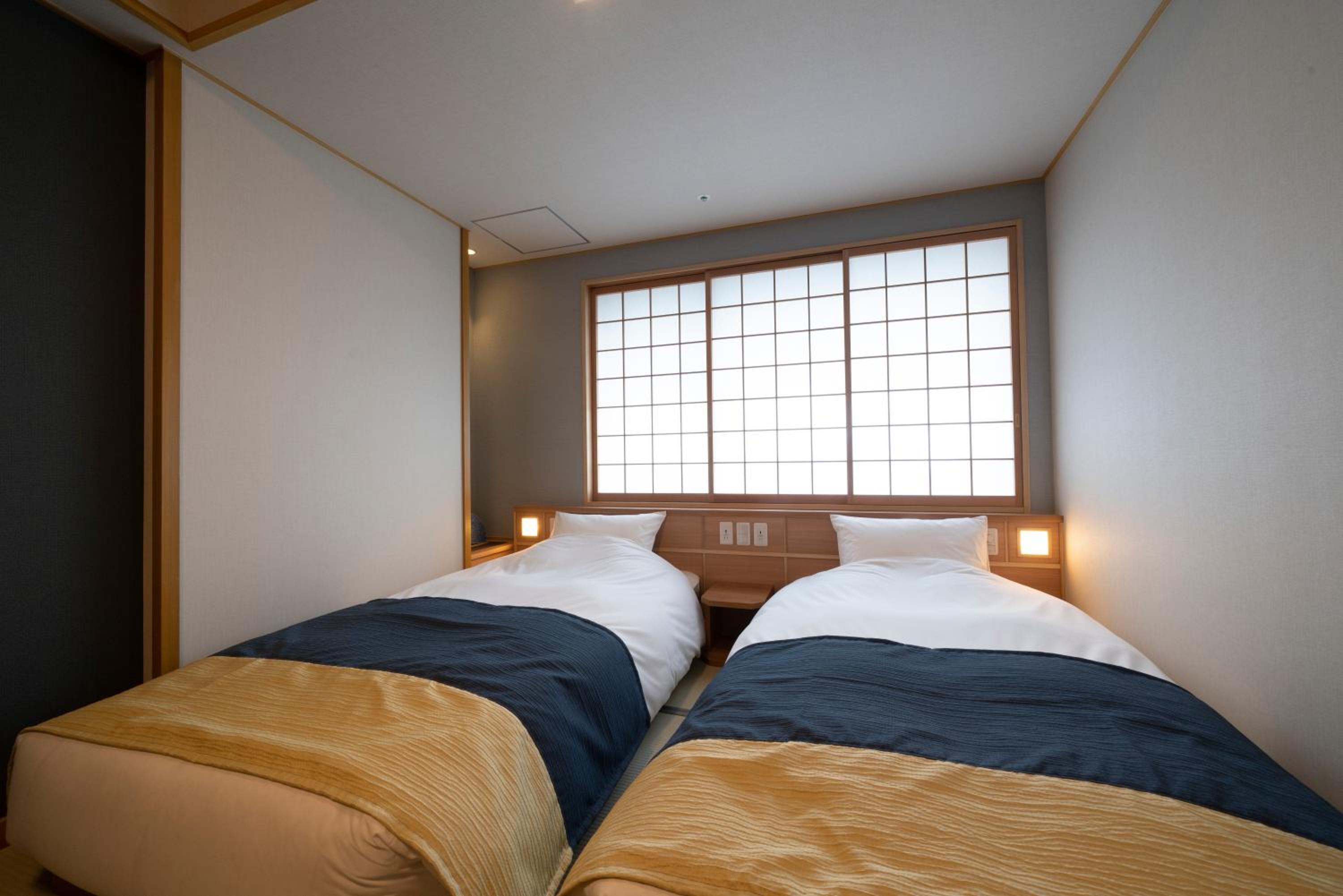 Deluxe Twin Room - Photo 3