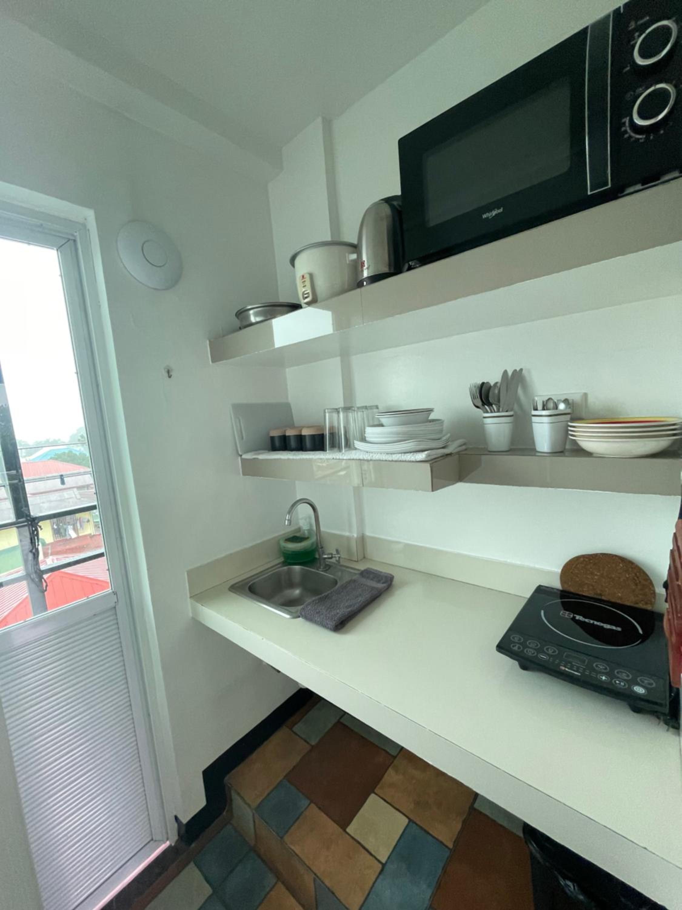 Family Room with Balcony - Photo 17