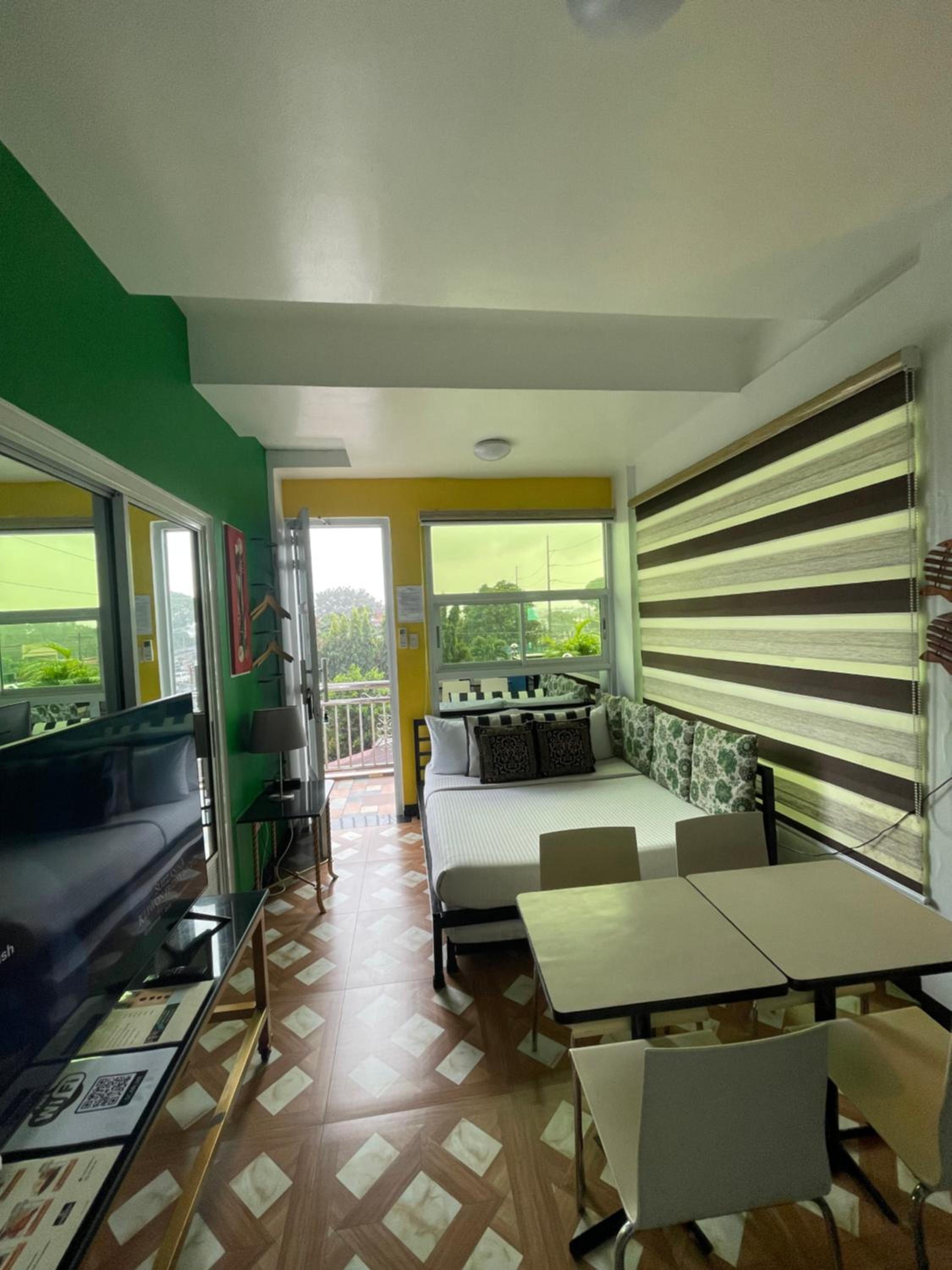 Family Room with Balcony - Photo 8