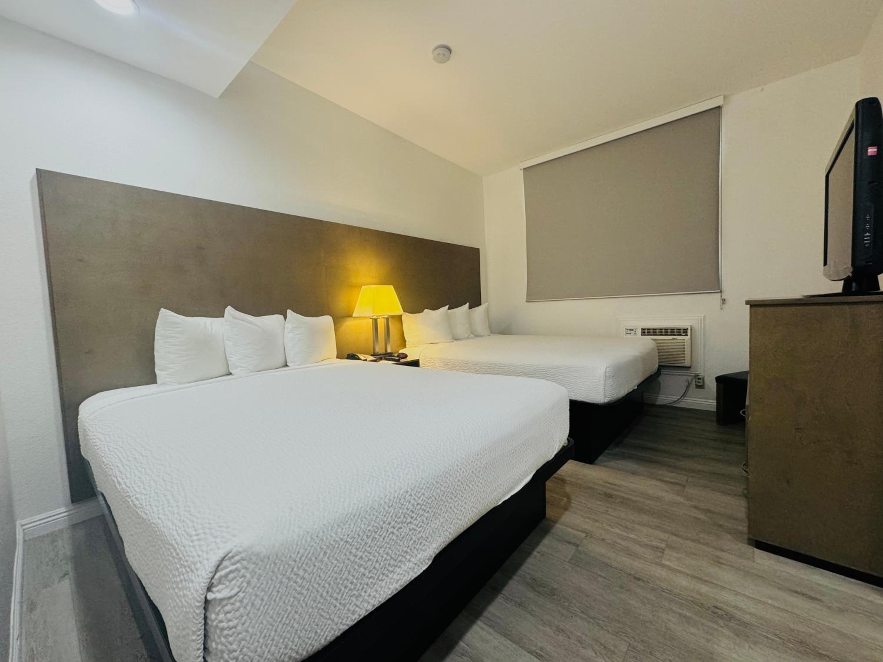 Queen Suite with Two Queen Beds - Disability Access/Non-Smoking photo 1