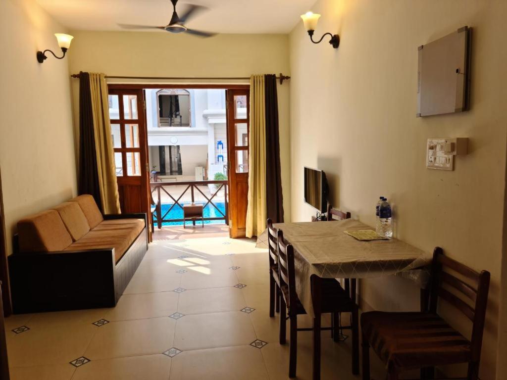 Two bedroom apartment with living room and balcony pool view