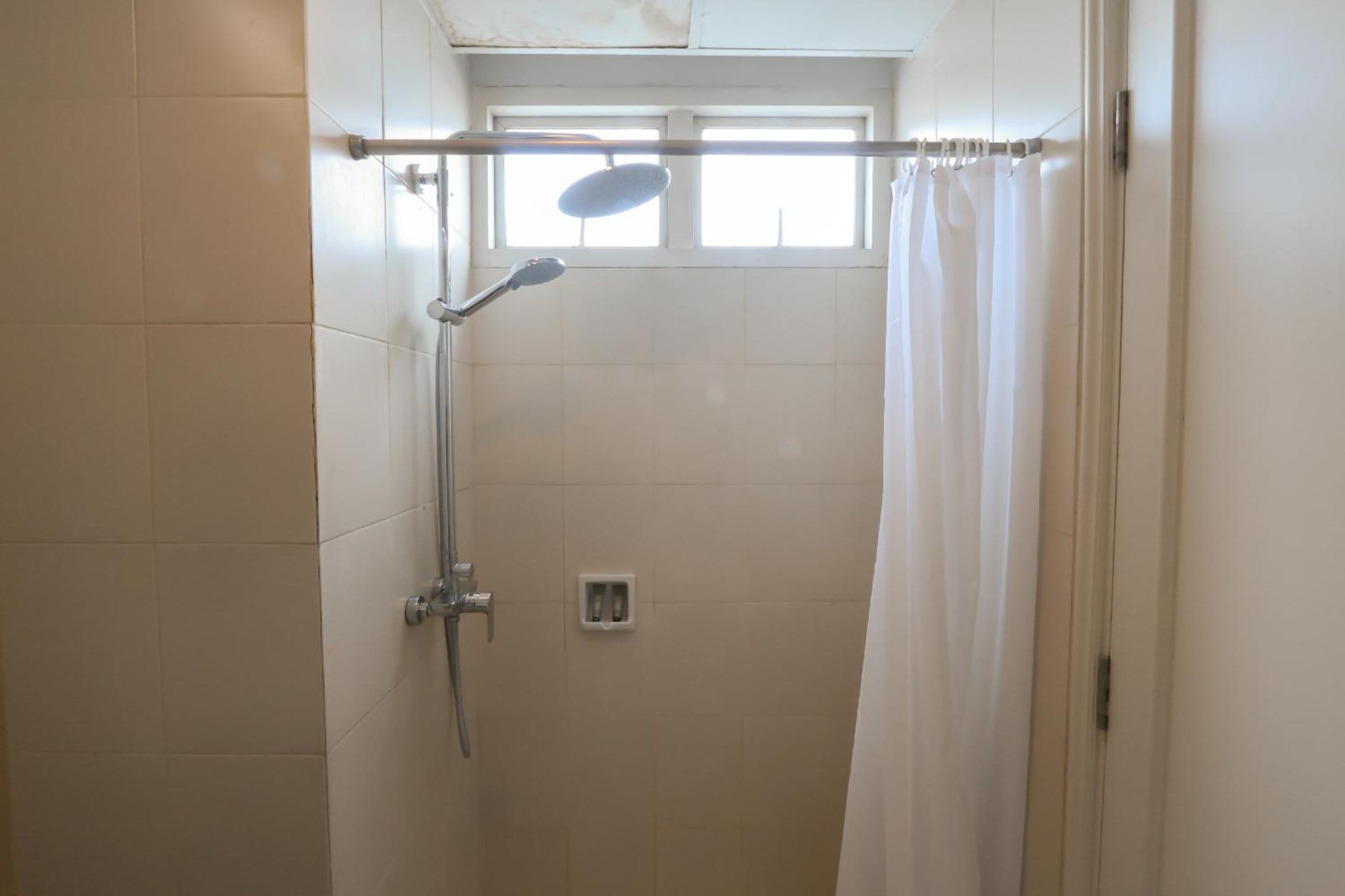 Three-Bedroom Apartment - Photo 25