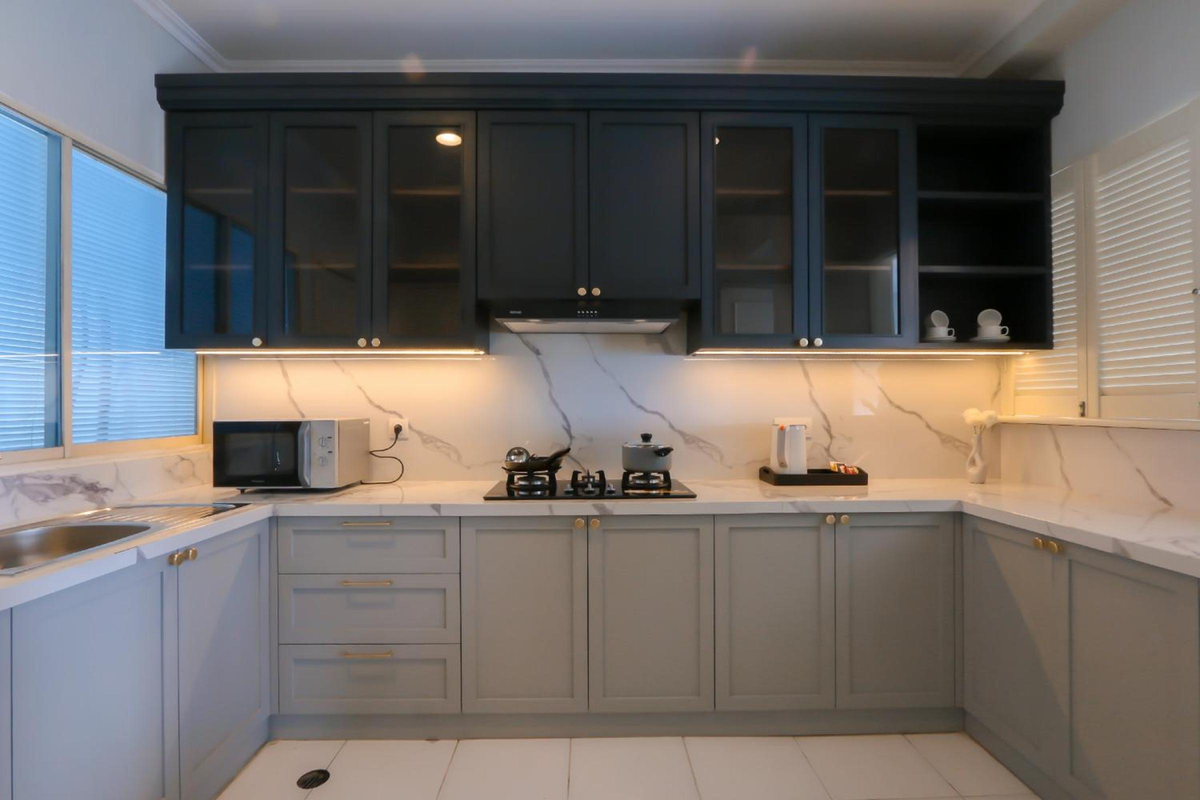 Three-Bedroom Apartment - Photo 23
