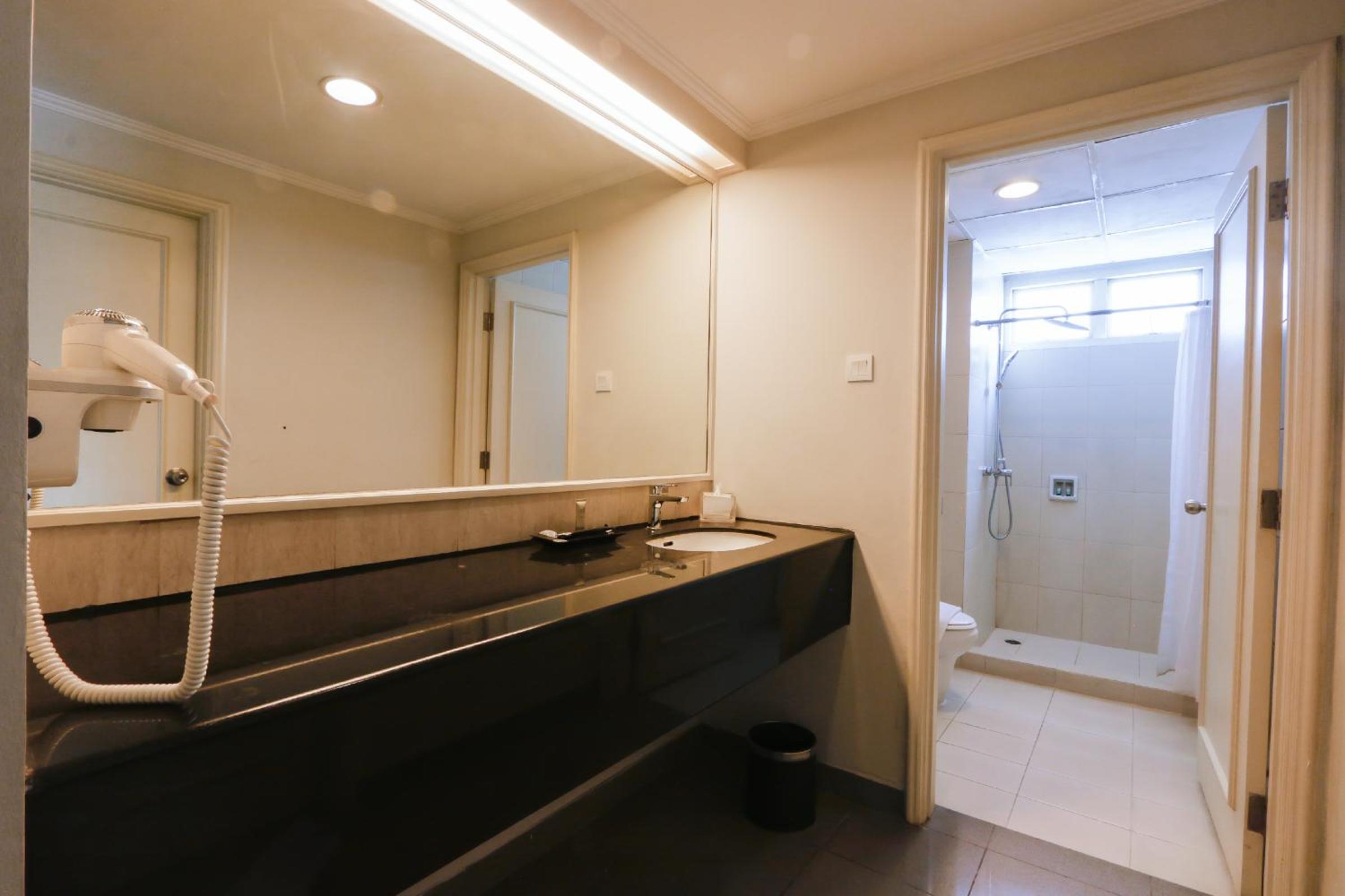 Three-Bedroom Apartment - Photo 18