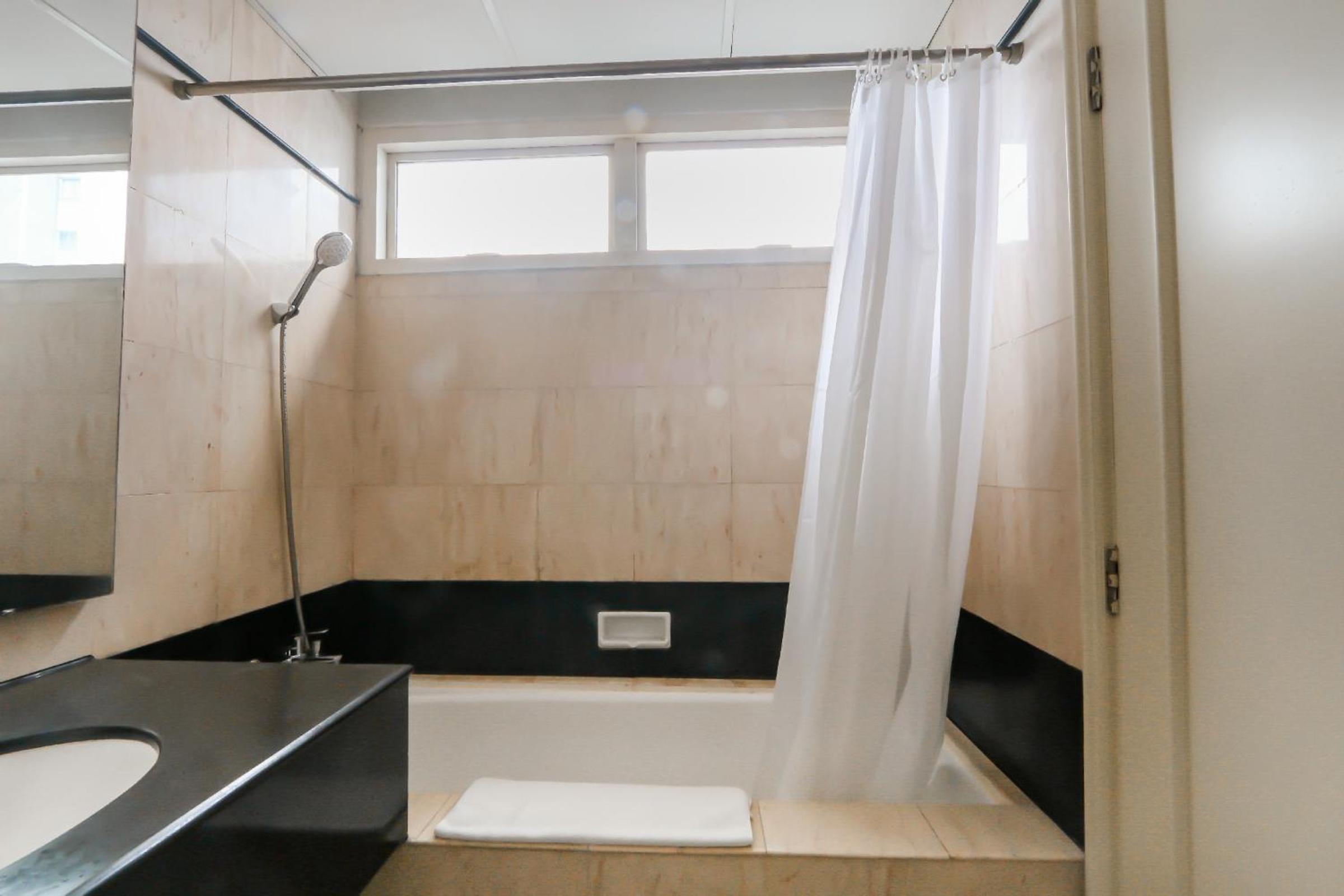 Three-Bedroom Apartment - Photo 13