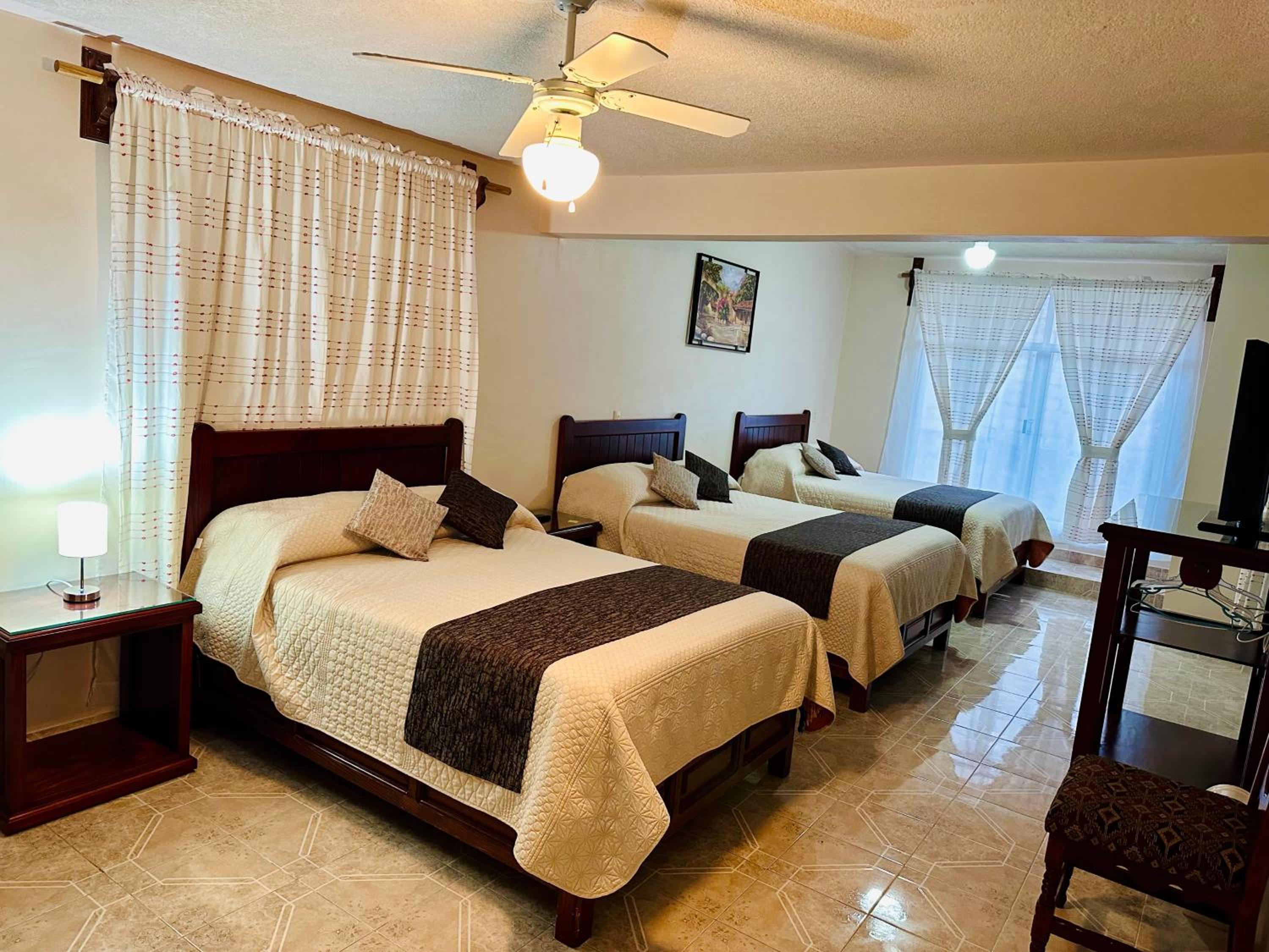 Triple Room with Private Bathroom photo 2