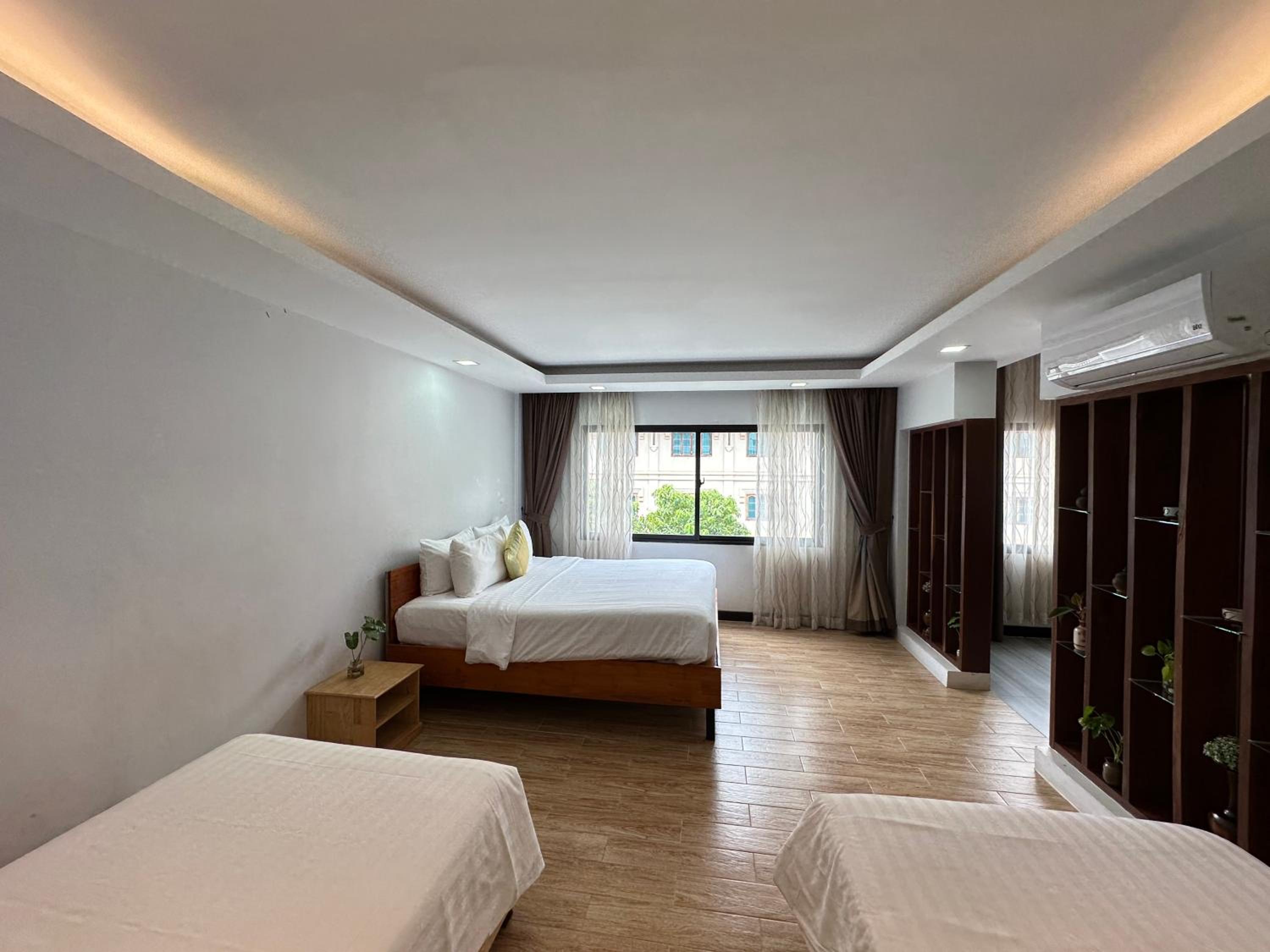 Deluxe Triple Room - Photo 6