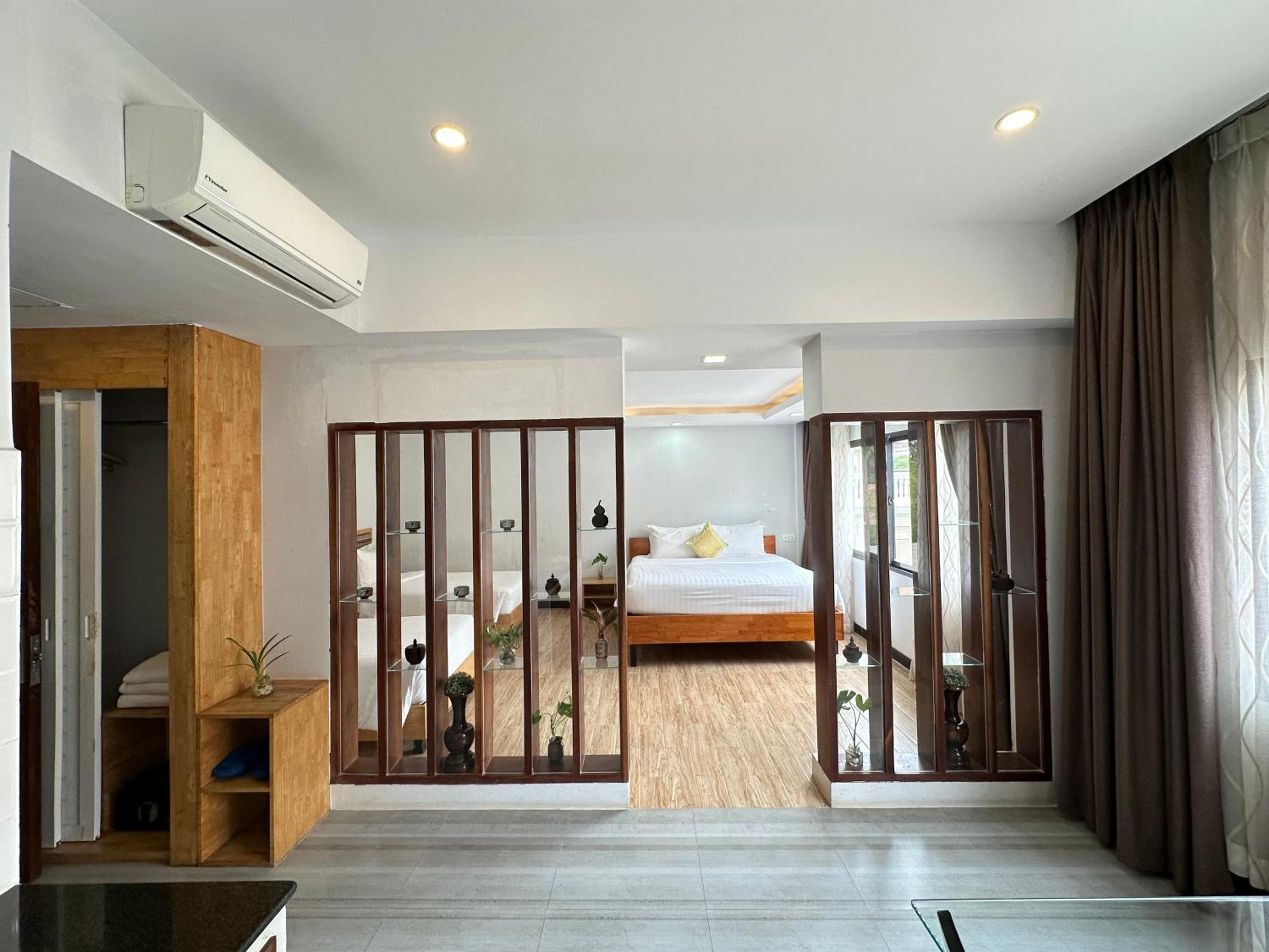 Deluxe Triple Room - Photo 1