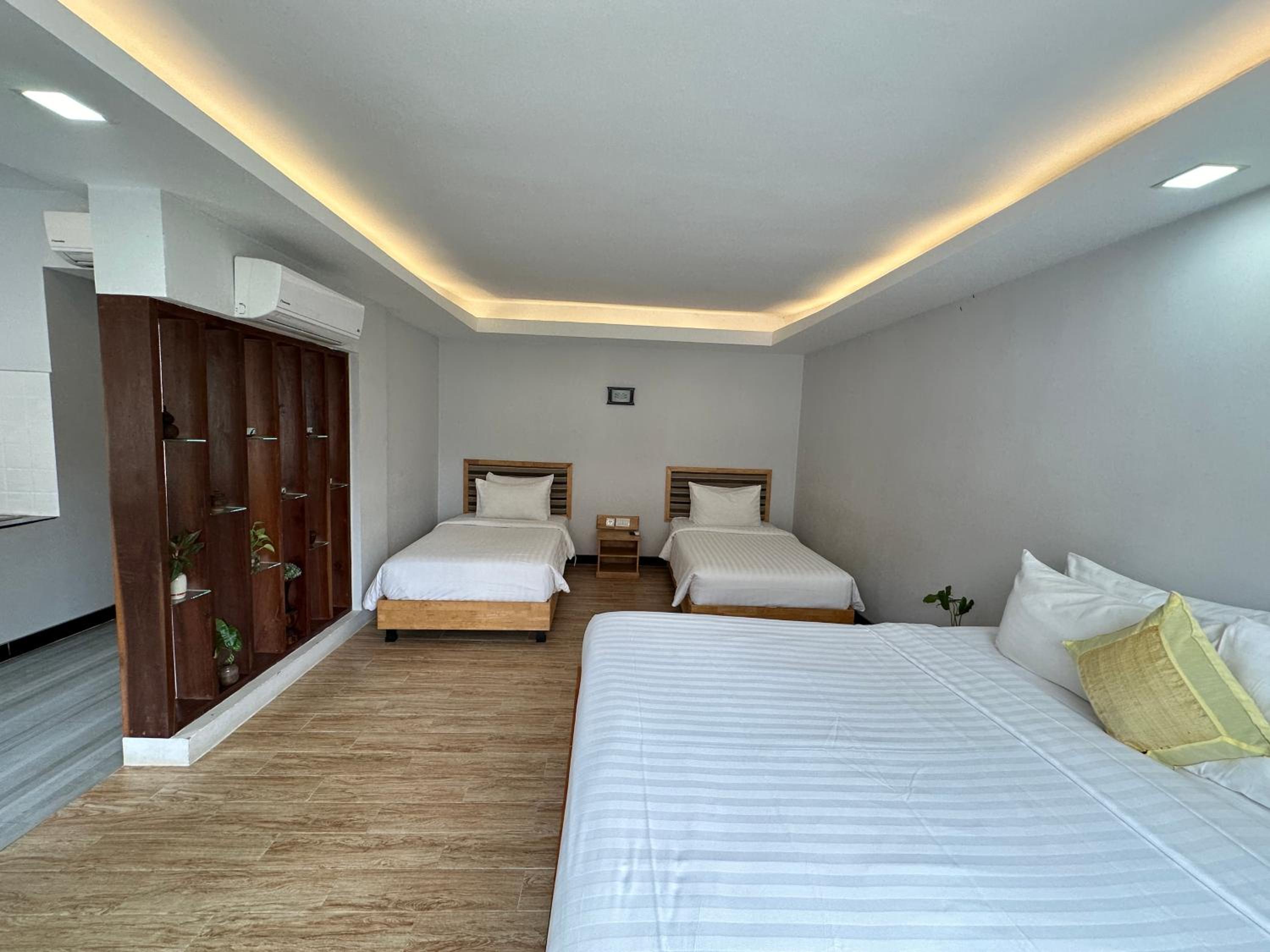 Deluxe Triple Room - Photo 5