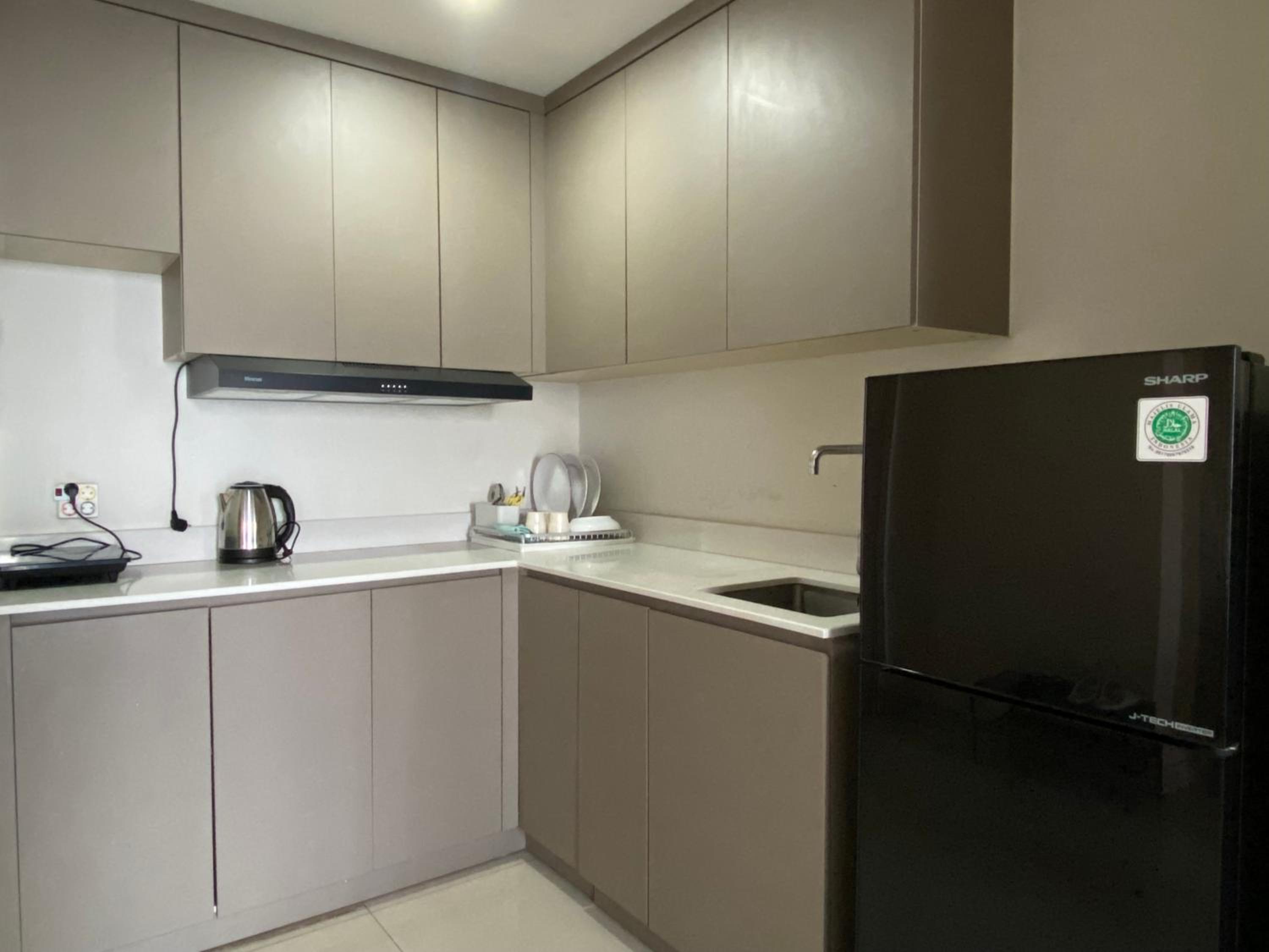 Three-Bedroom Apartment - Photo 23