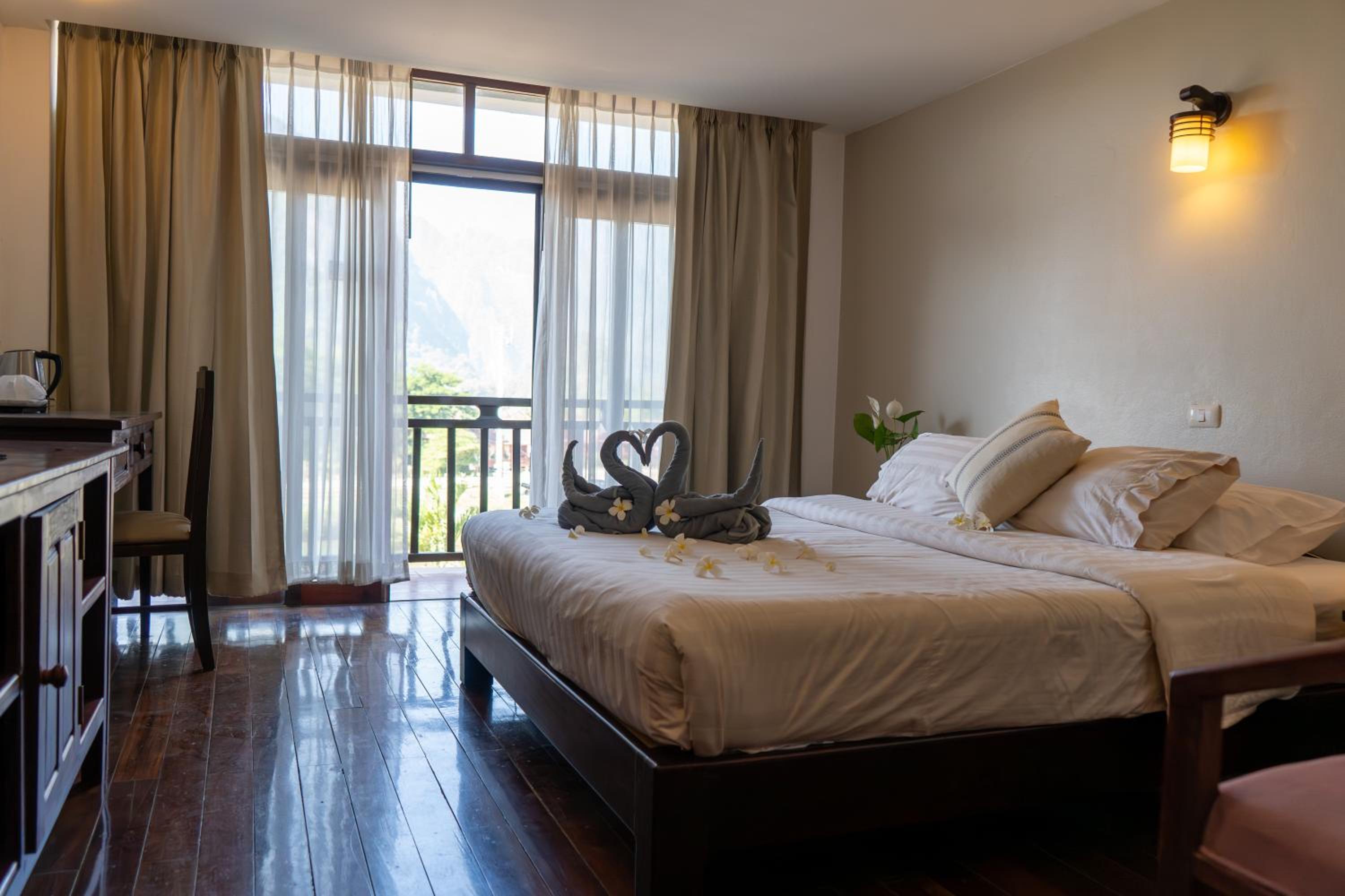 Deluxe Double Room with Balcony - Photo 1