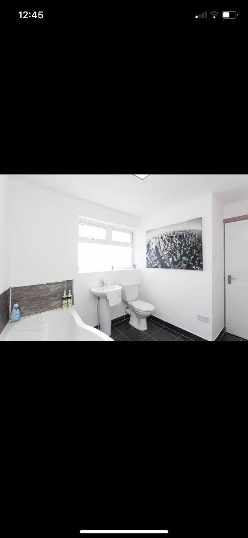 Three-Bedroom Apartment photo 2