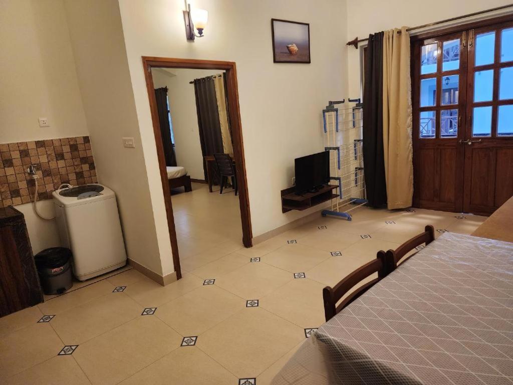 One bedroom apartment with living room and balcony pool view