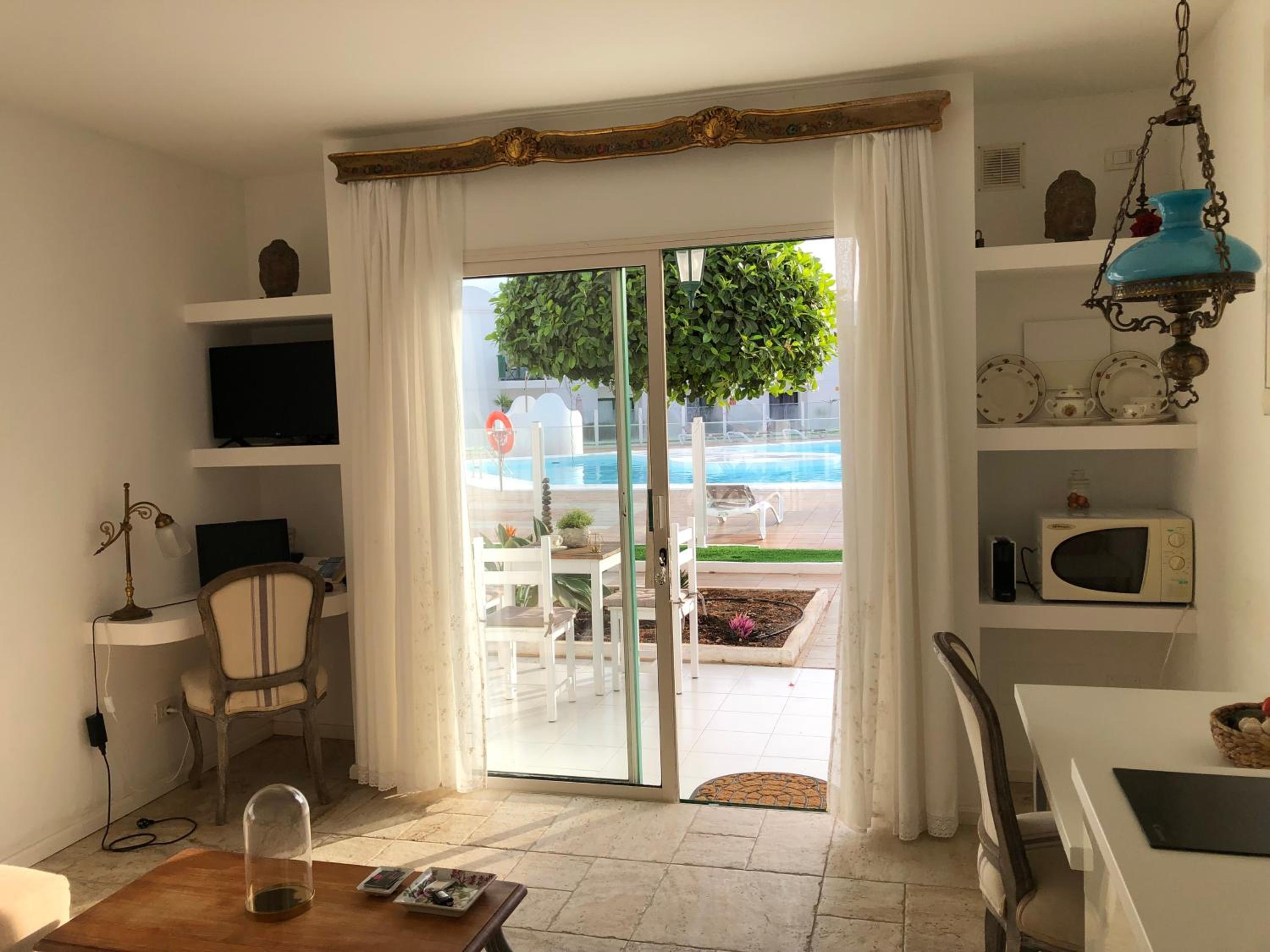 Apartamento con vista a la piscina
