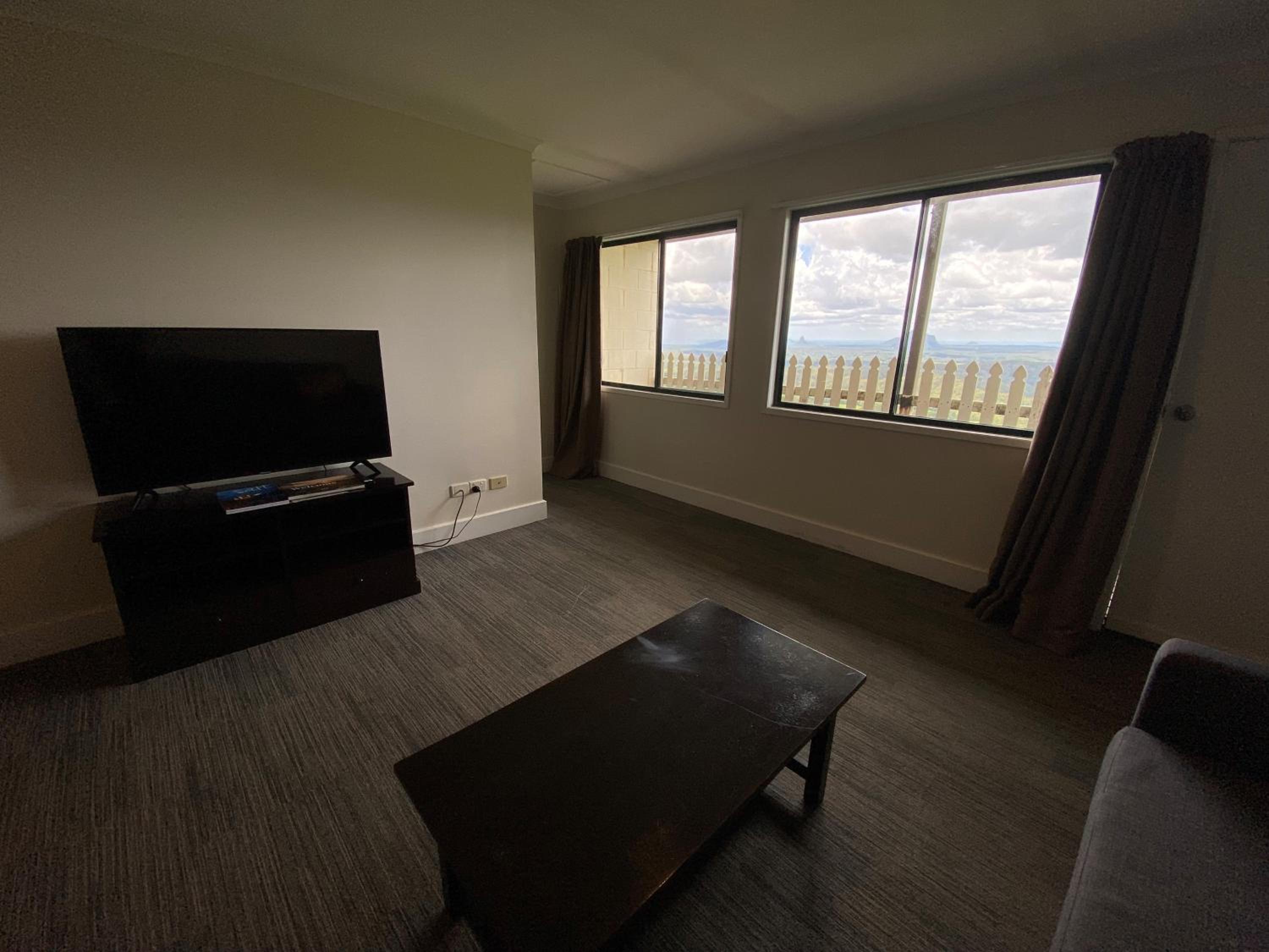 Two-Bedroom Unit with living area and stairs photo 3