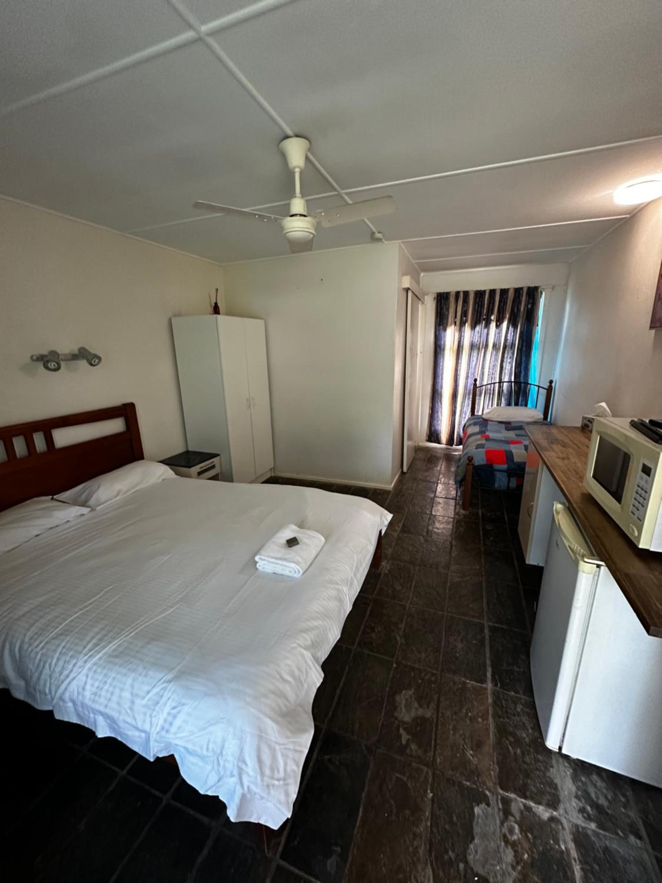 Deluxe Double Room (2 Adults + 1 Child) photo 2