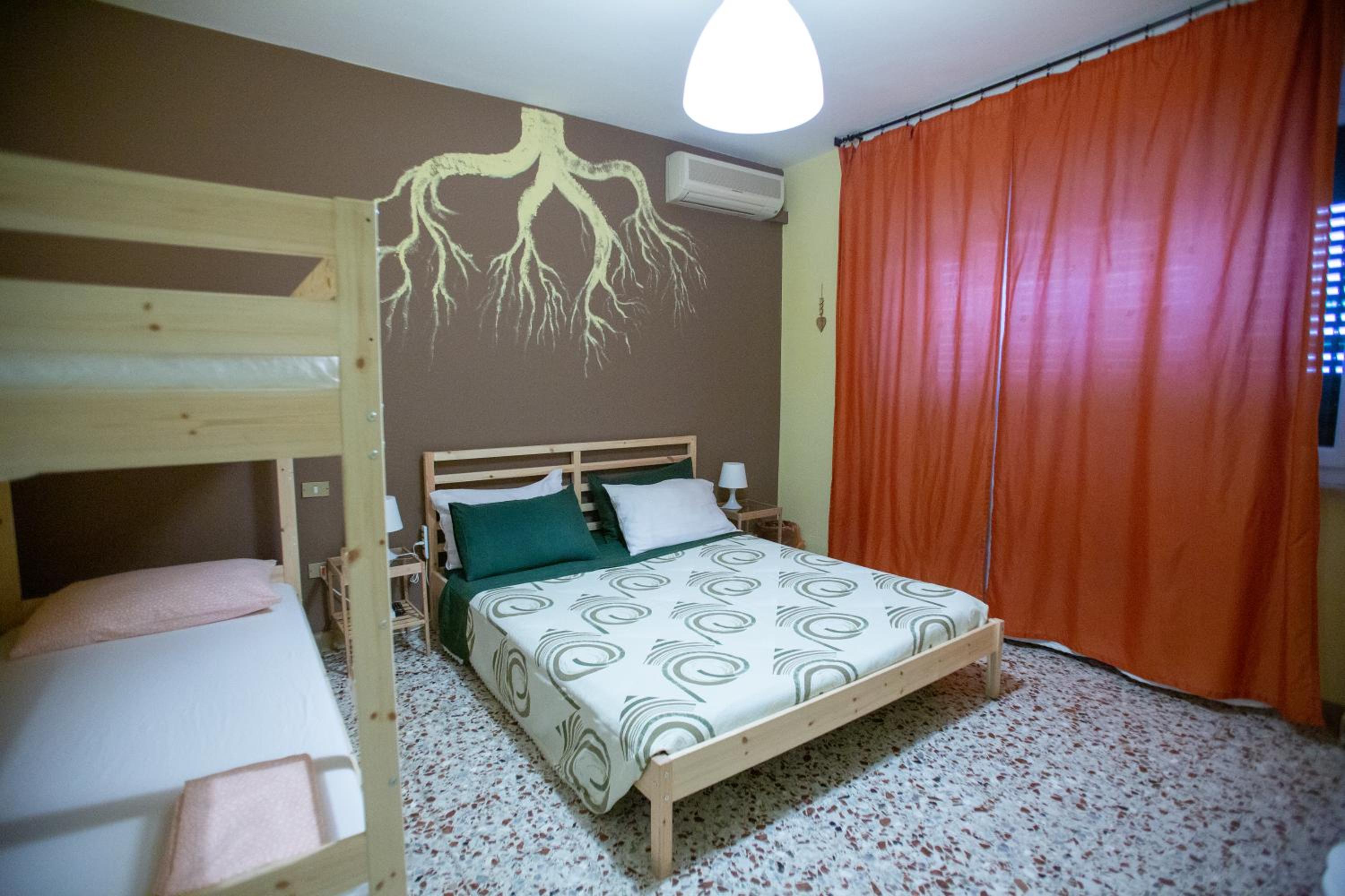 Quadruple Room with Shared Bathroom