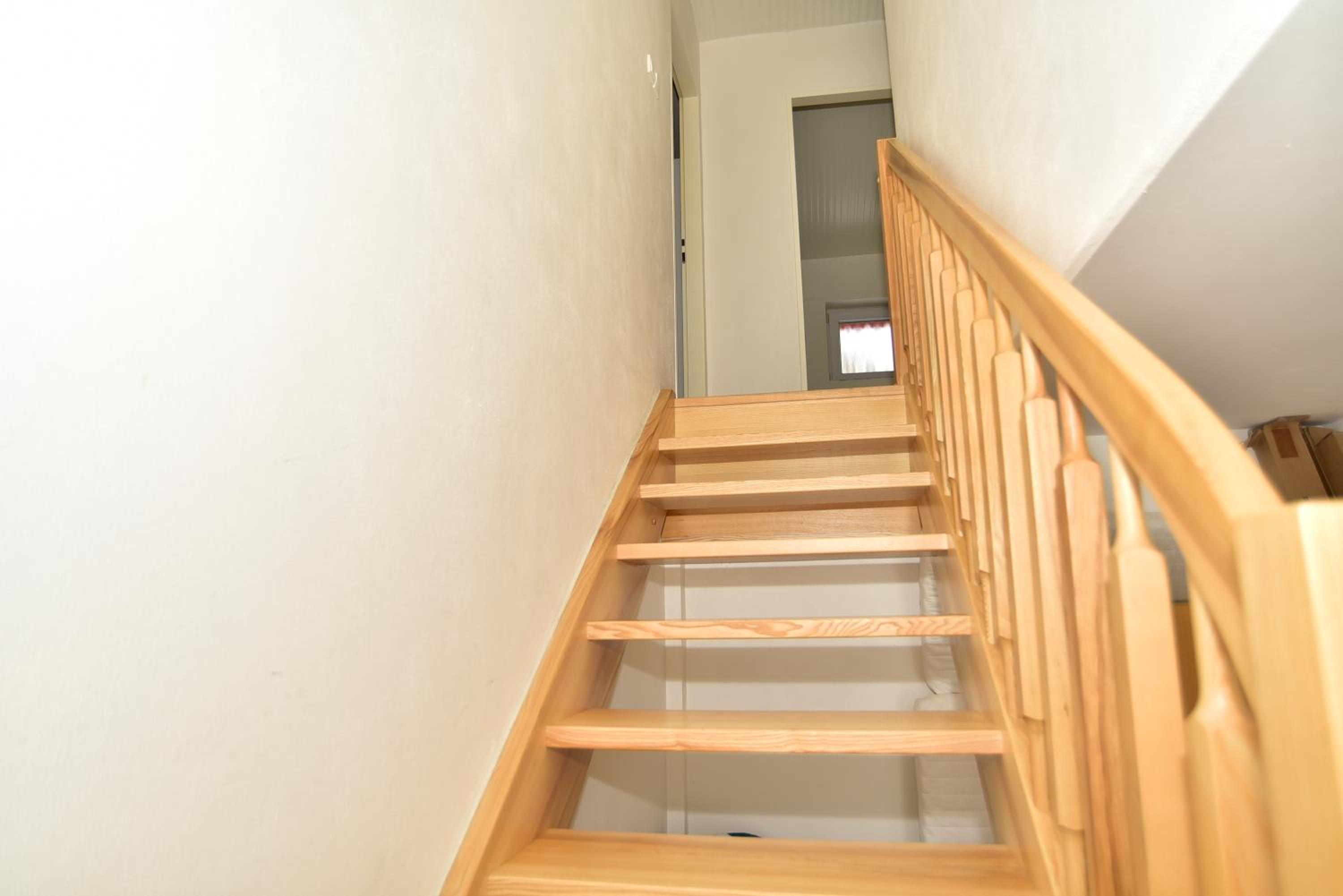 Three-Bedroom Apartment - Photo 40